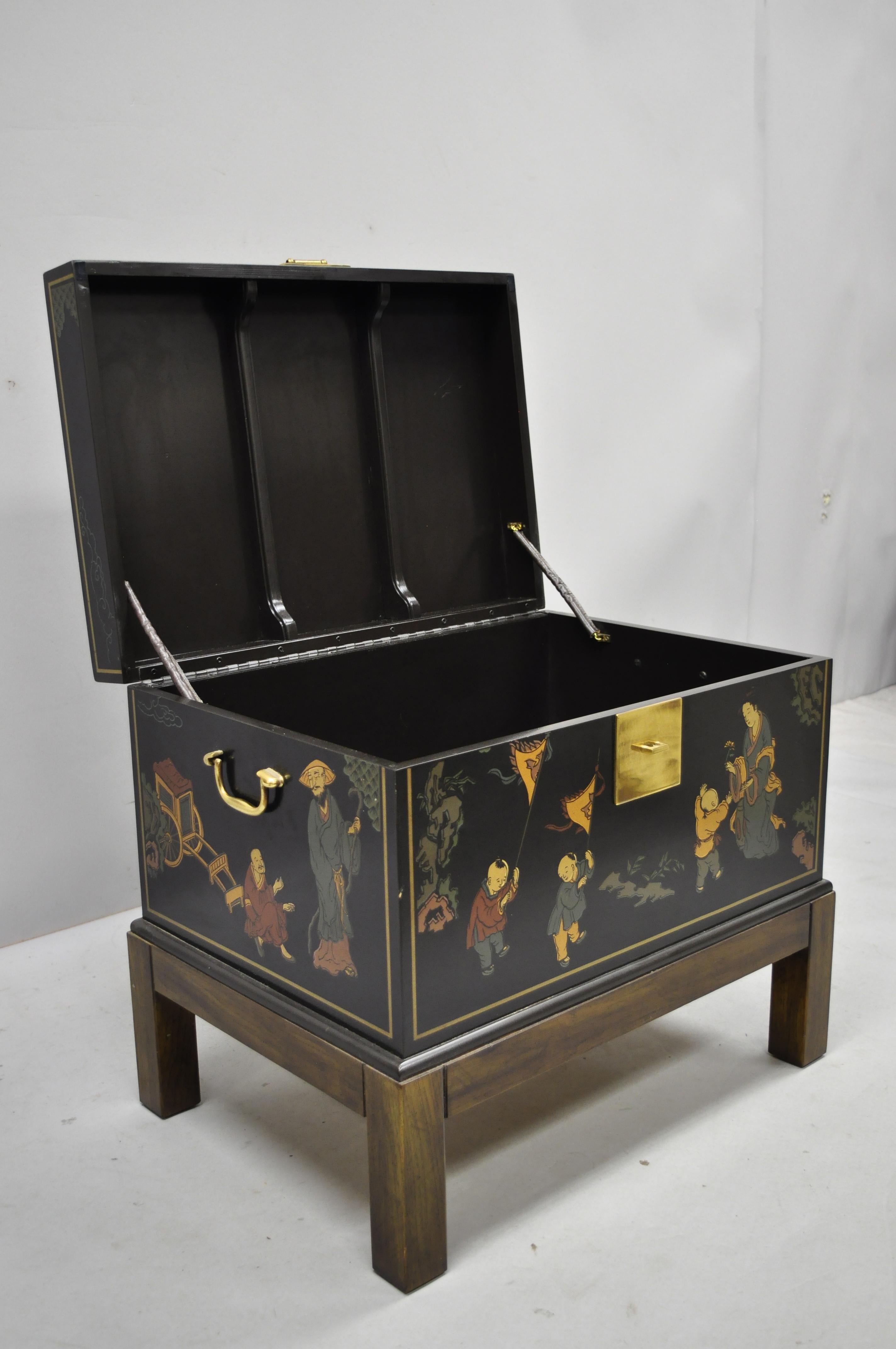 Vintage Drexel Et Cetera black chinoiserie oriental storage trunk chest. Listing features hand painted details, wood construction, serial number (584 150), solid brass hardware, quality American craftsmanship, circa mid-20th century. Measurements: