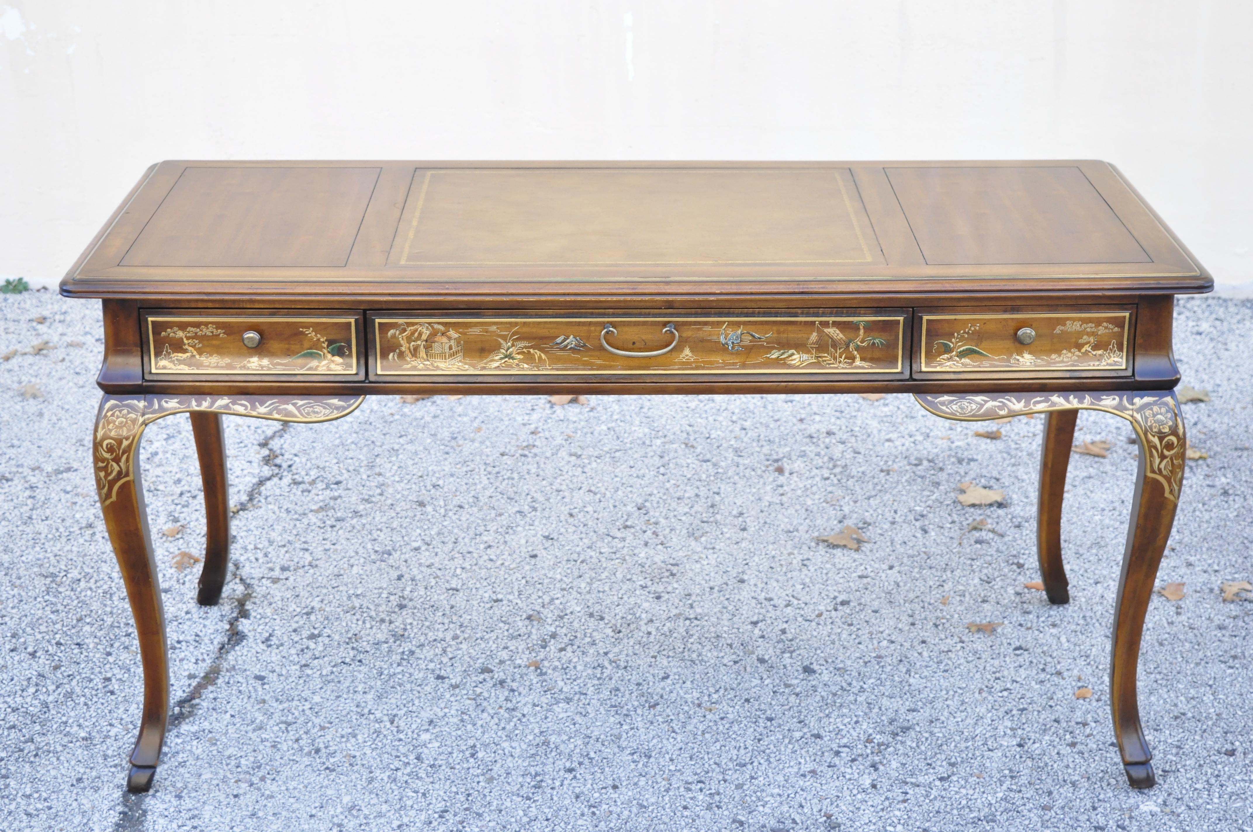 Vintage Drexel Et Cetera Chinoiserie leather top hand painted writing desk. Item features leather top, solid wood construction, beautiful wood grain, hand painted finished back, original label, 3 dovetailed drawers, cabriole legs, quality American