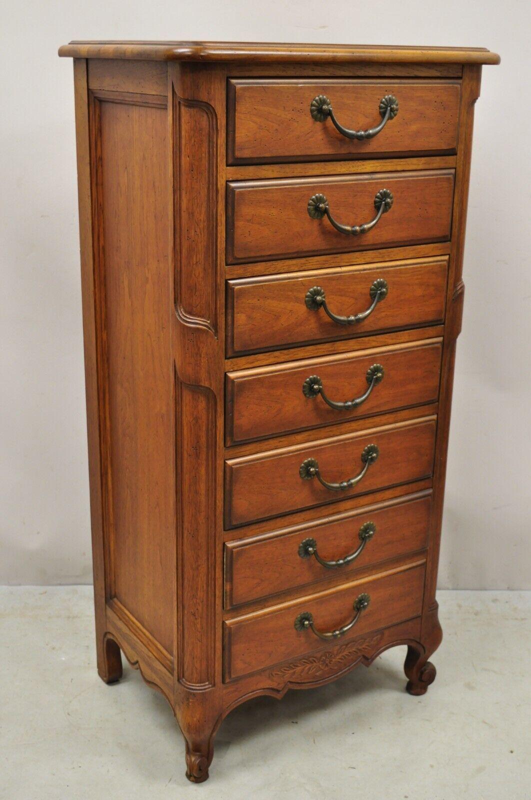 Vintage Drexel French Country Manner 7 Drawer Lingerie Chest & Drawers. Item features solid wood construction, beautiful wood grain, original stamp, cabriole legs, 7 dovetailed drawers, solid brass hardware, very nice vintage item, great style and