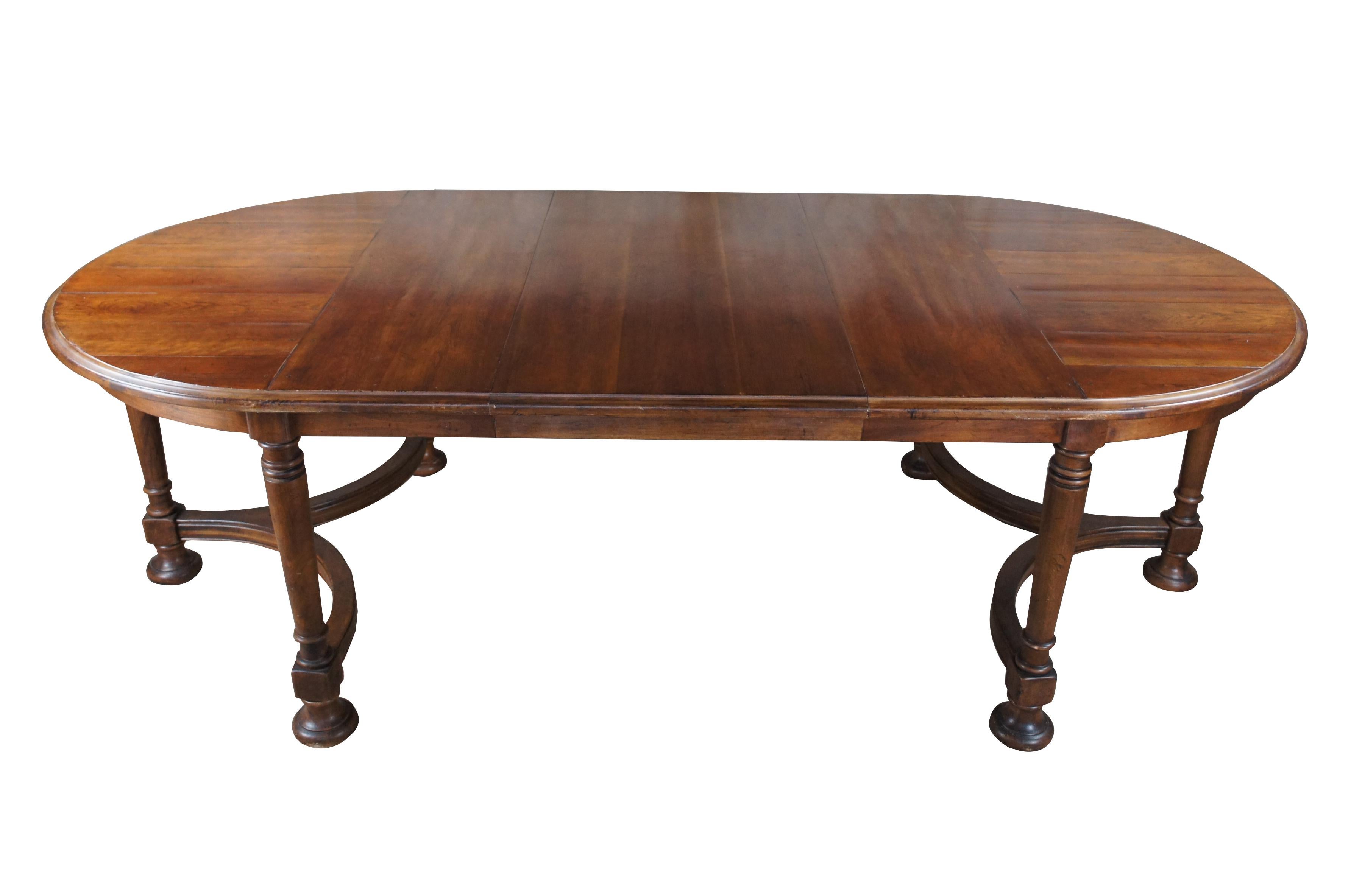 Vintage Drexel Heritage Old World / Tuscan style dining table.  Made of cherry featuring oval form with plank top and William and Mary style base.  Marked Drexel 211-620

Dimensions:
76