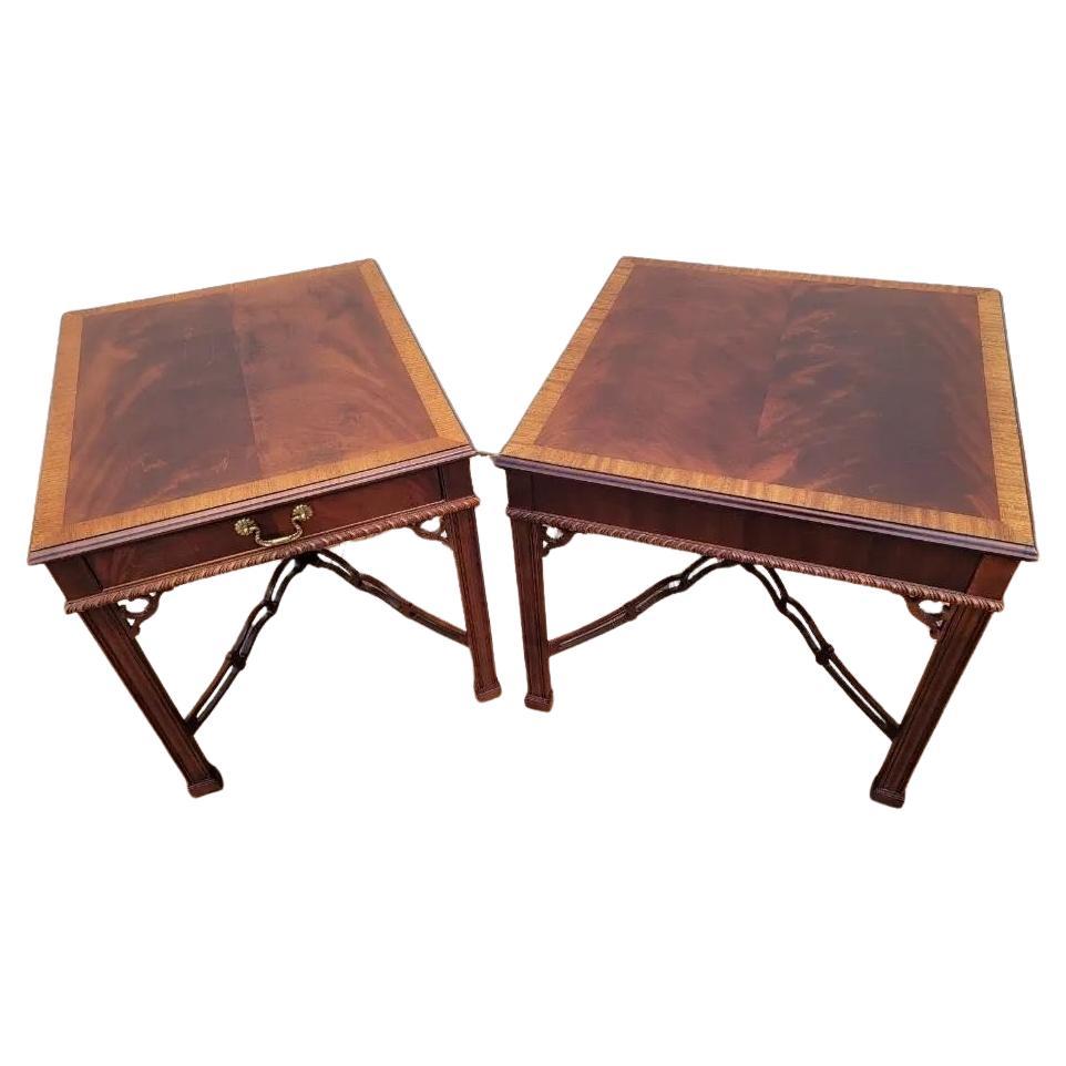 Vintage Drexel Heritage Chippendale Banded-Top Flame Mahogany Accent Tables - Set of 2

Vintage Drexel Heritage set of 2 Chippendale Chinoiserie style banded-top flame mahogany accent tables with finely carved trim. The table legs end in block feet