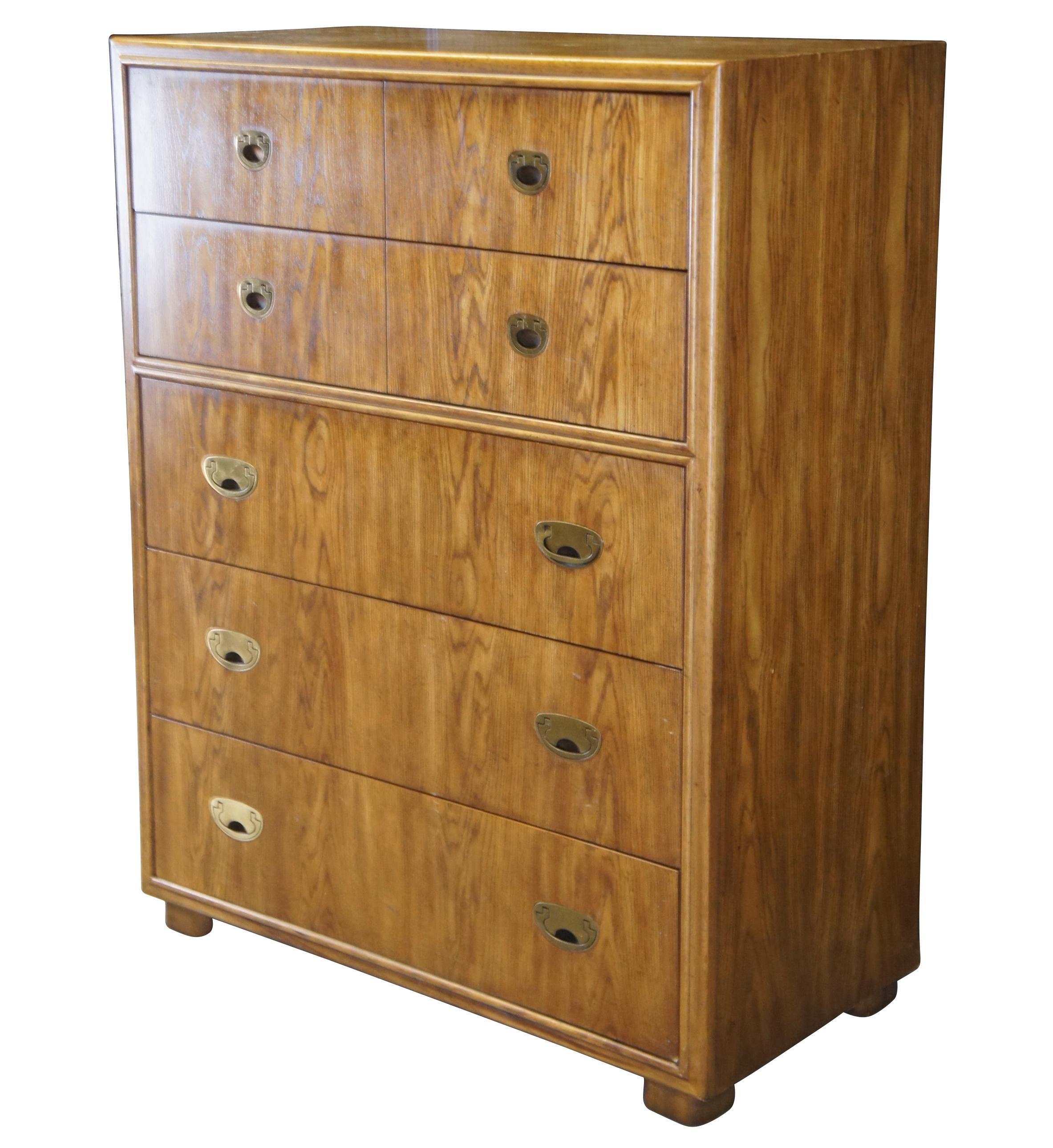 Drexel Heritage Passage Collection Highboy Dresser, circa 1988, no 915-410-2.  Features a rectangular frame made from oak with 5 dovetailed drawers featuring inset brass drawer pulls.  A great addition to any mid century modern space.

Dimensions: