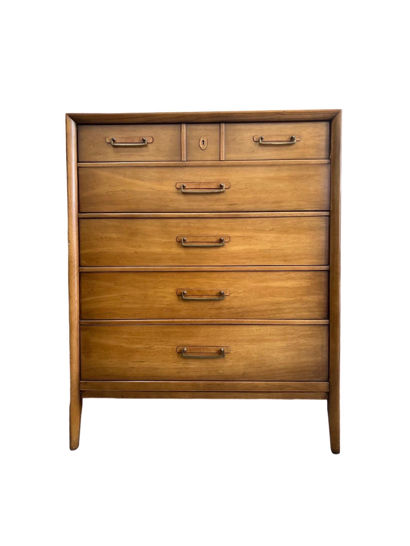 Vintage Drexel solid Pecan Mid-Century Modern dresser designed by James Bouffard.

Dimensions. 36 W ; 45 H ; 19 D.