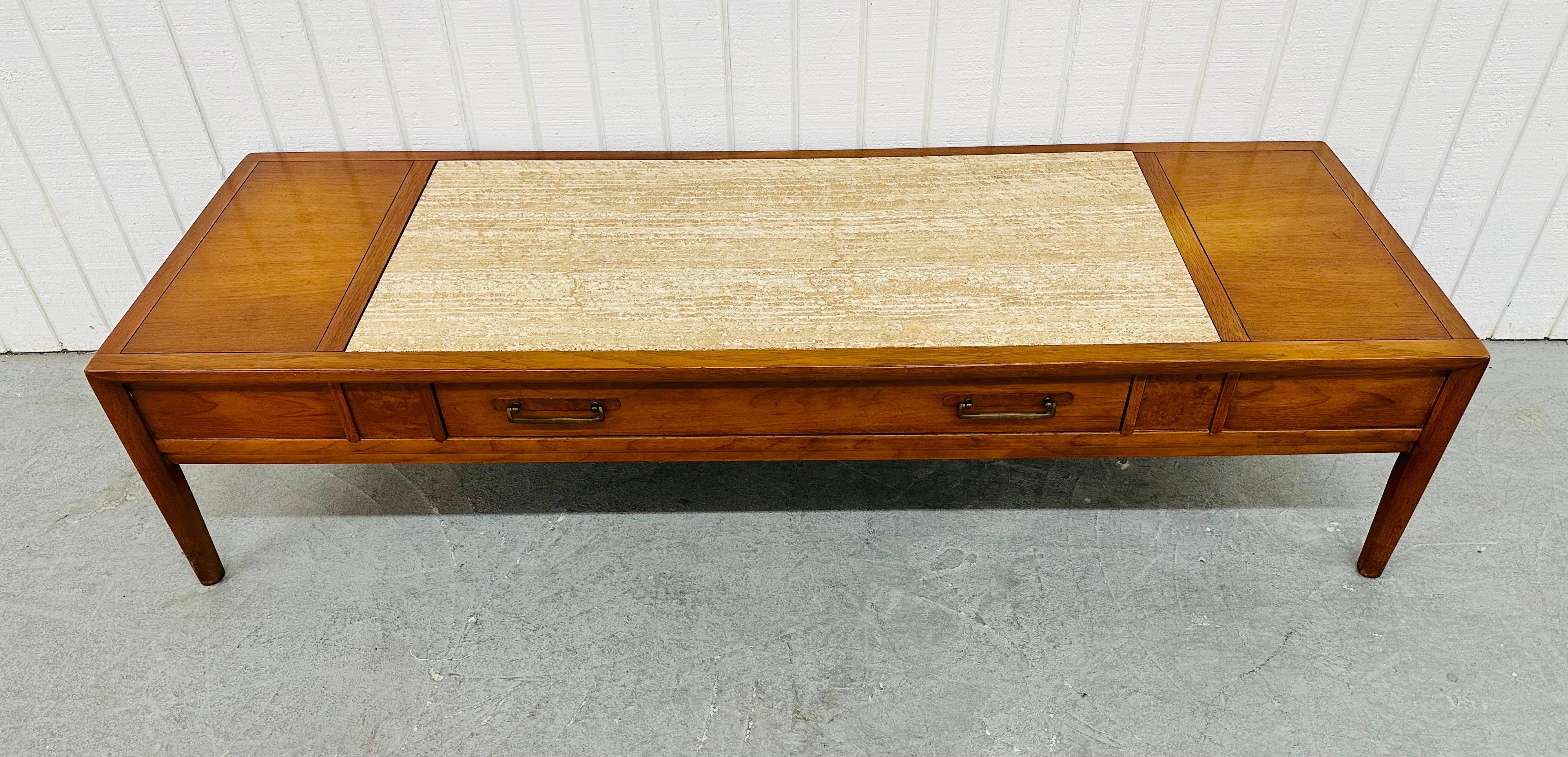 This listing is for a Vintage Drexel Walnut & Travertine Coffee Table. Featuring a straight line design, center travertine insert, single drawer for storage, original hardware, four modern legs, and a beautiful walnut finish. This is an exceptional