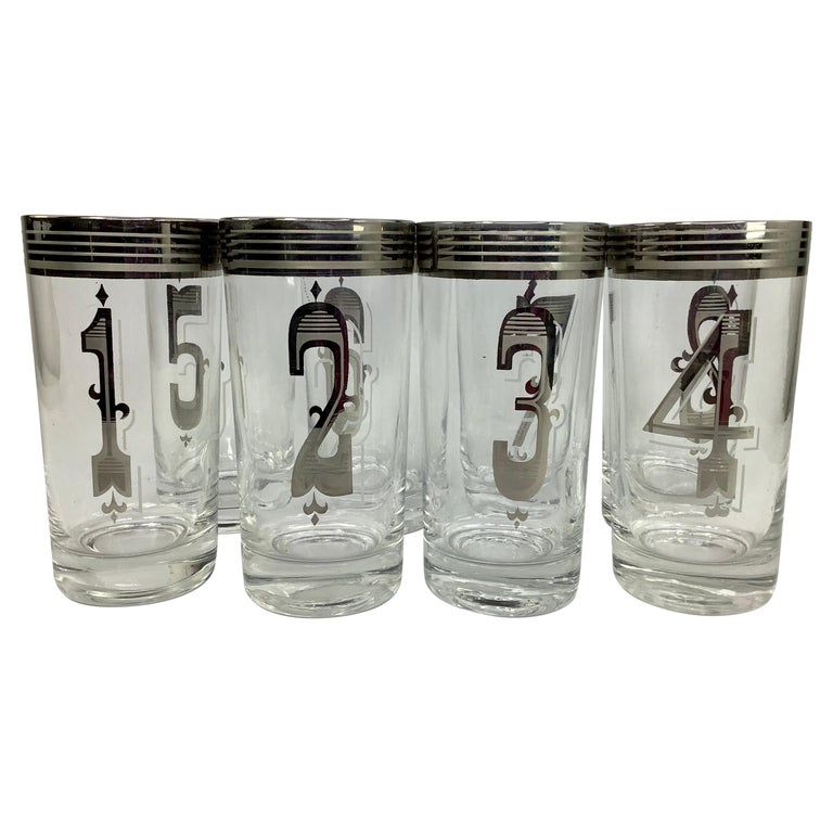 https://a.1stdibscdn.com/vintage-drinks-by-the-numbers-highball-glasses-set-of-8-numbered-glasses-for-sale/f_73712/f_358202421692739279106/f_35820242_1692739280401_bg_processed.jpg?width=768