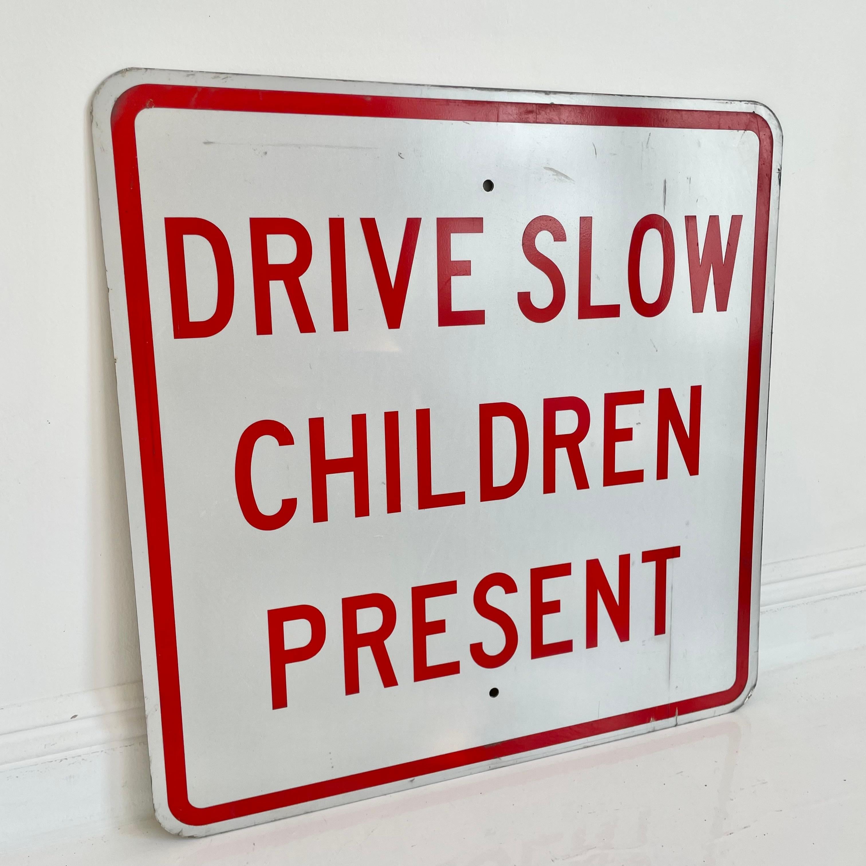 drive slow children sign