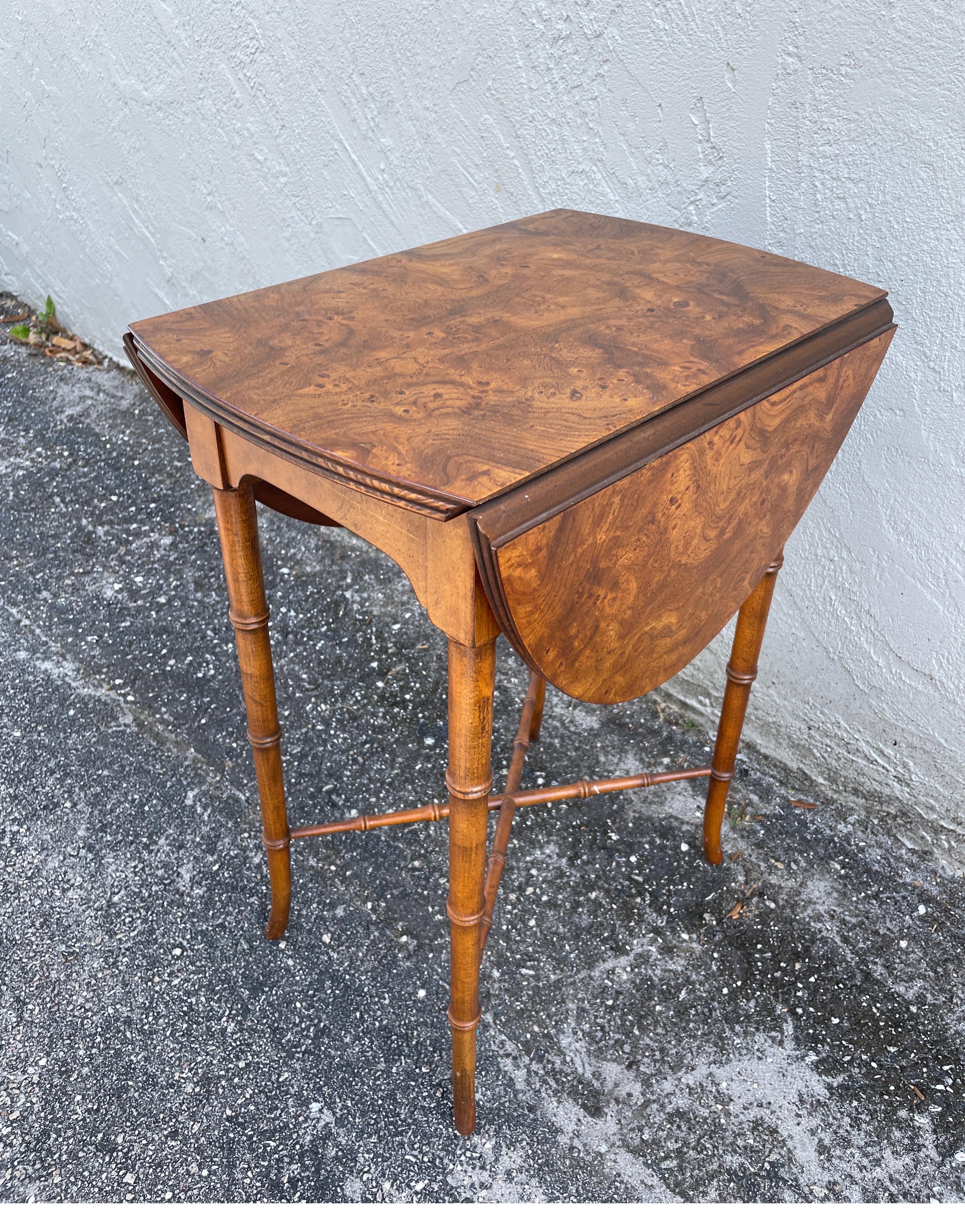 Vintage burl drop leaf side table by Baker. Fully opens to an oval shape that measures 17