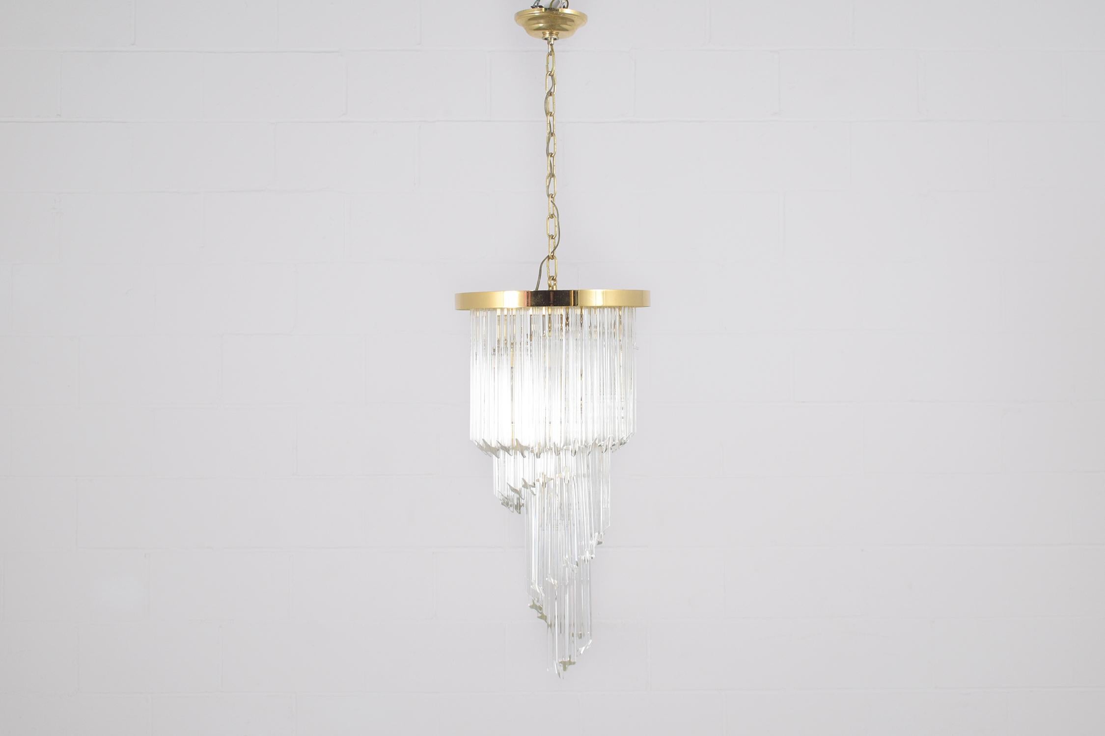 Italian Vintage Drop Pendant Chandelier: Timeless Elegance in Brass and Glass For Sale