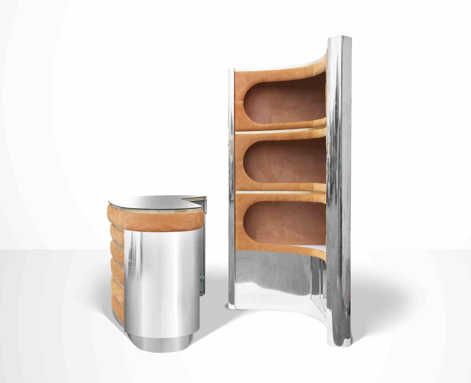 Beautiful vintage dry bar designed in the 1970s and attributed to Willy Rizzo. Orange suede, chromed metal bars.

The set includes: illuminated shelves, a counter with a mirrored glass top, chrome sides.

Shelf dimensions: H. 75.98in. / 193cm; Sides