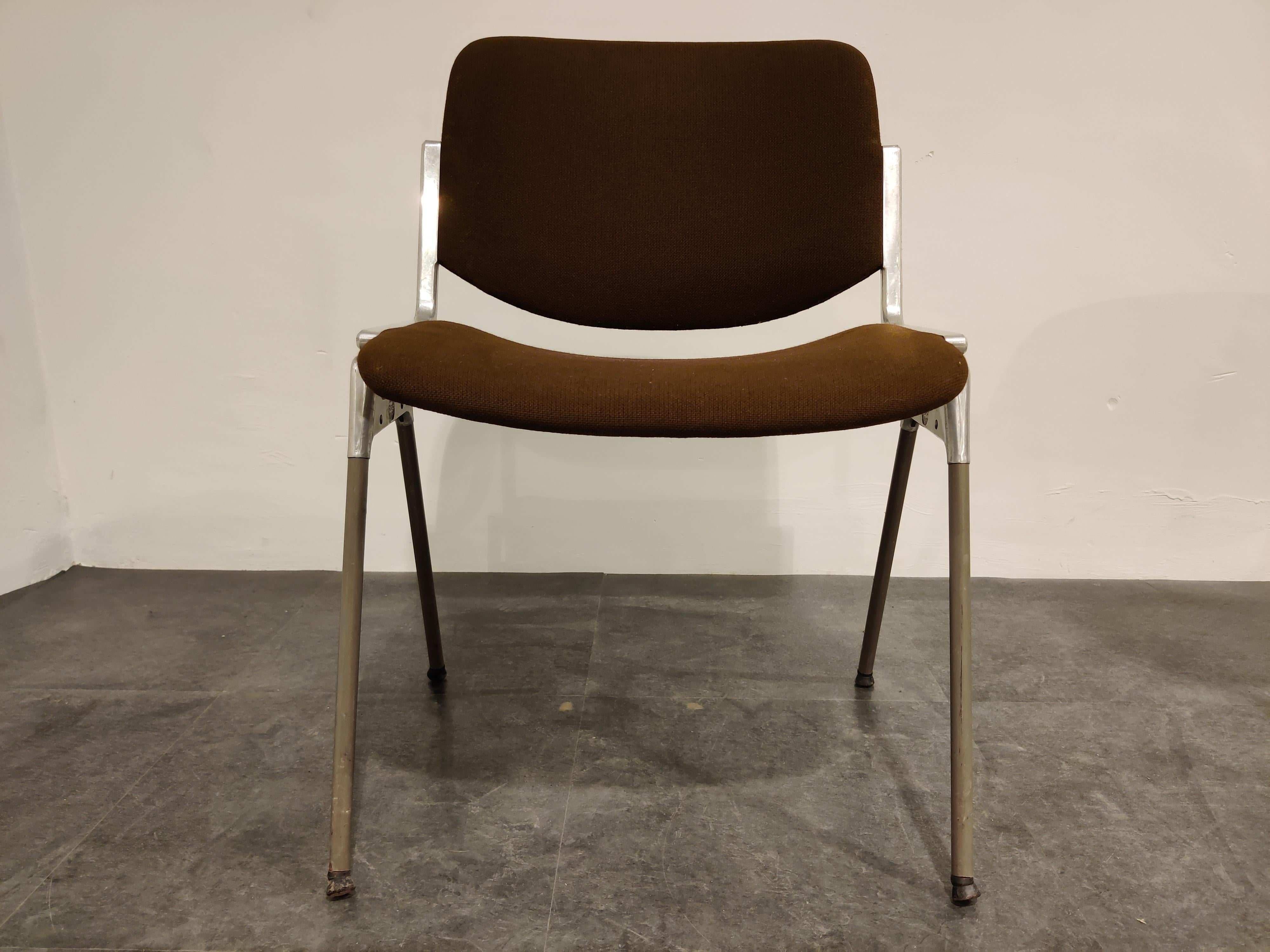 Vintage dining chairs or side chairs designed by Giancarlo Piretti for Castelli.

We have 15 pieces available

These chairs can be stacked up in large amounts and save up a lot of space for occasional use.

Original brown fabric.

Normal user