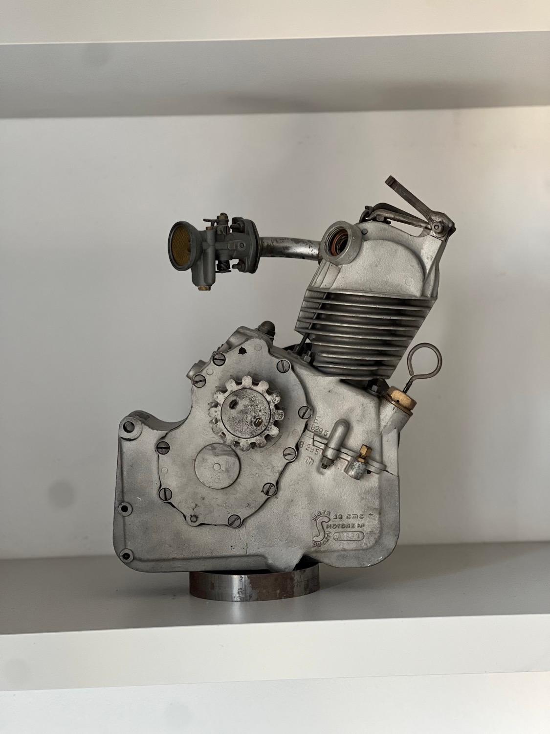 Loft Decoration- Man Cave Accessory - Ducati Engine

Petrolheads, behold! This is an authentic engine coming right off of a vintage 1960s Ducati motorbike. Naturally made in Italy, it is an unusual and attractive piece that is guaranteed to set a