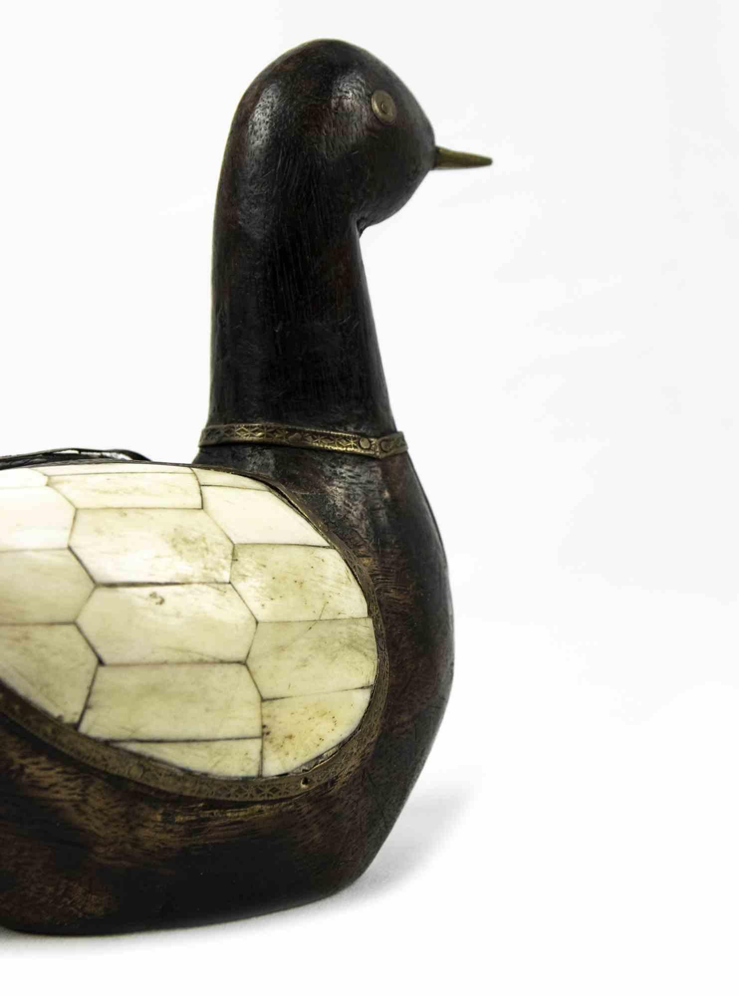 Vintage Duck is an original decorative object realized in the mid-20th century. 

A unique wooden, brass and mother of pearl object perfect to give a naif touch to your home!

Good conditions except for some signs due to the time.