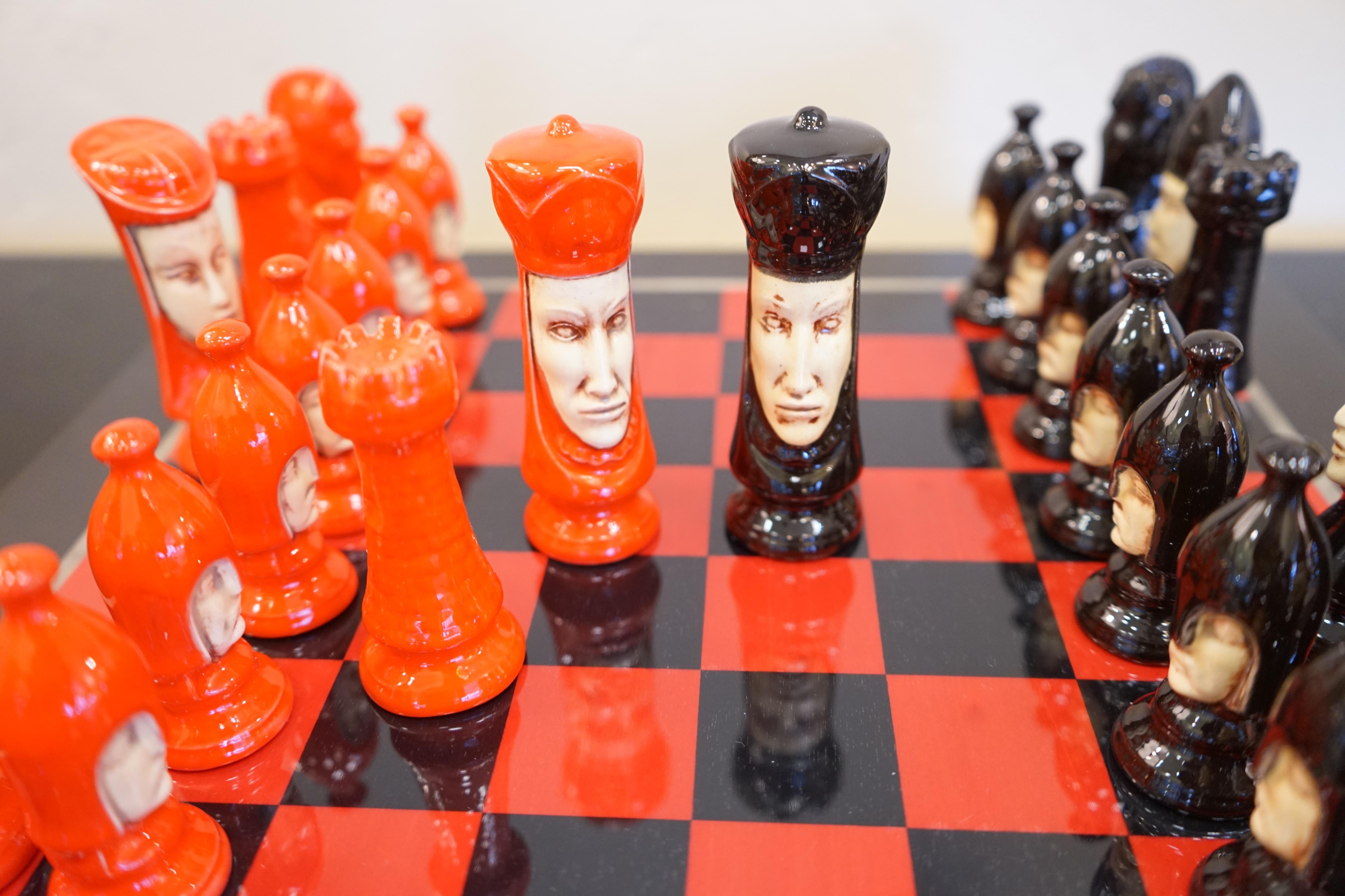Vintage Duncan Medieval Style Red and Black Chess Set and Board In Good Condition In Aspen, CO