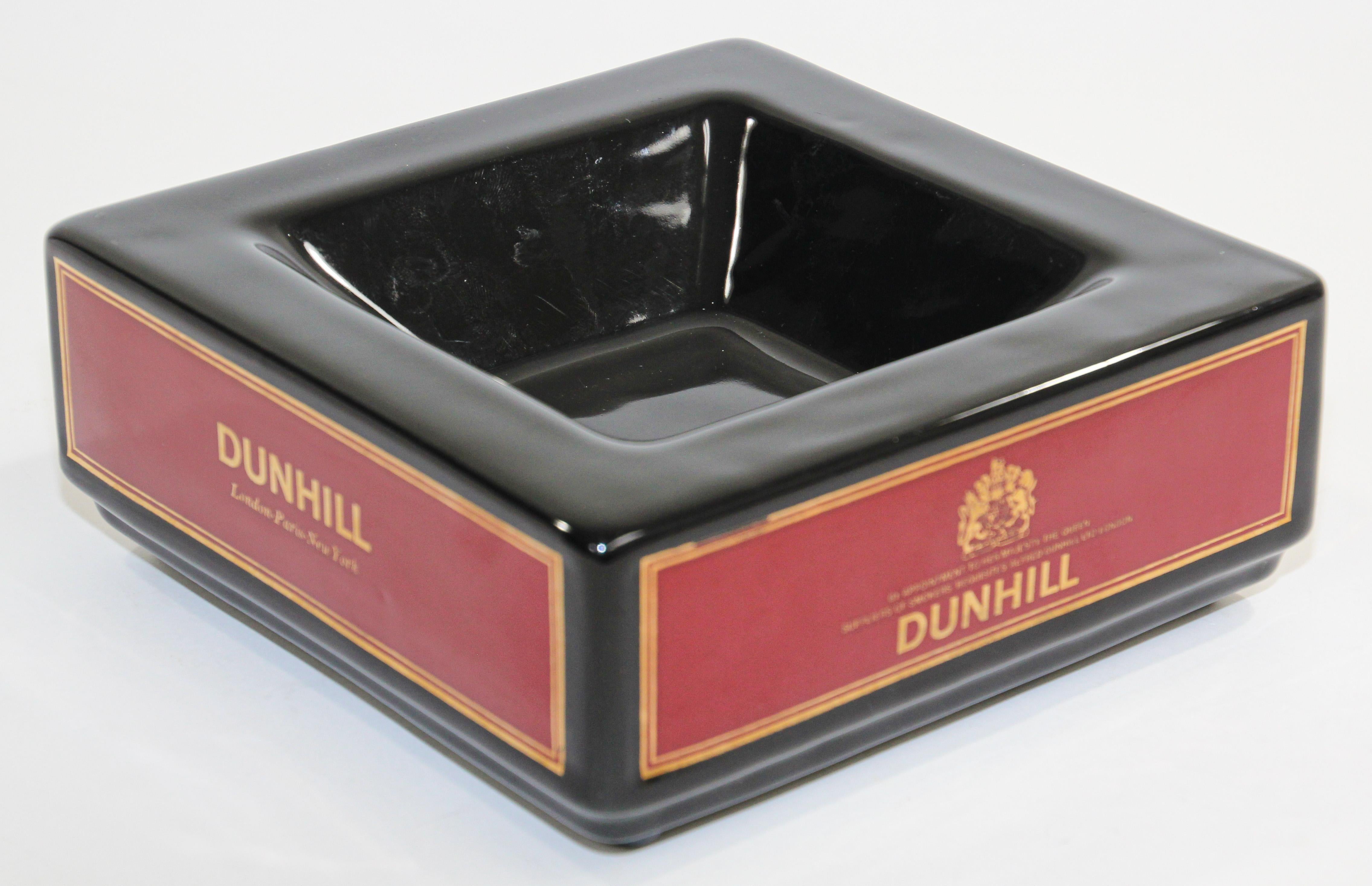 Large Vintage Dunhil ceramic square collectible ashtray by Wade England Royal red and black.
Vintage Alfred Dunhill collectible porcelain cigar ashtray by Wade, England.
Material: Glazed prestige porcelain with gold lettering on red borders.
Dunhill
