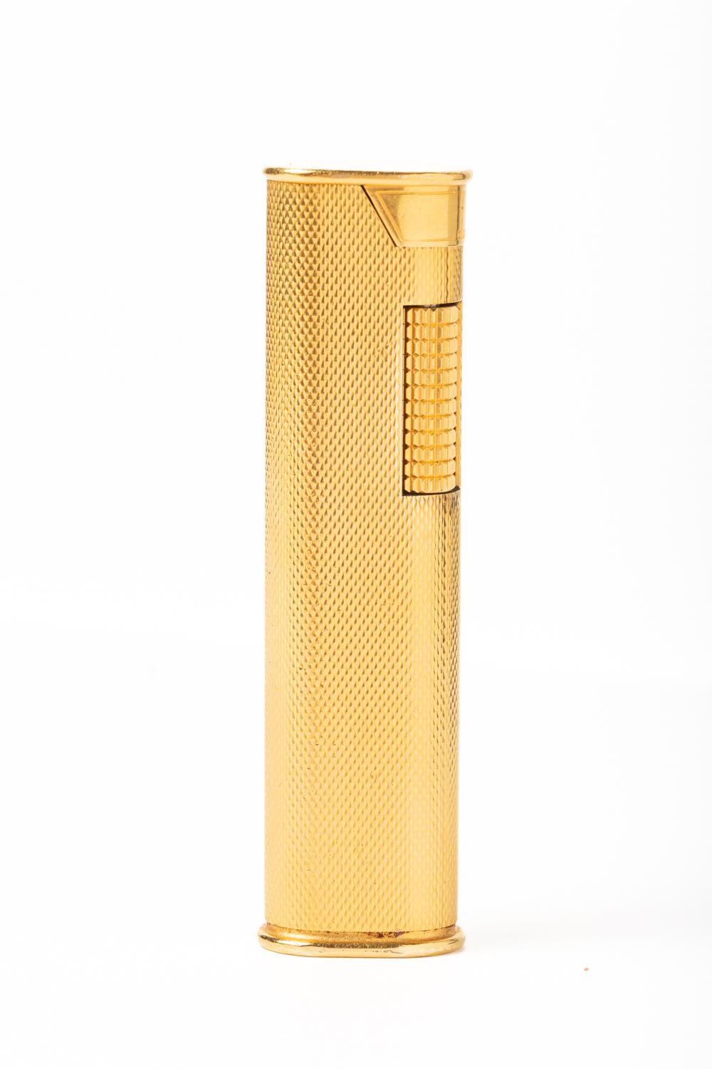 Very rare and elegant vintage Dunhill gold plated 'Slim' lighter This lighter was made in 1960's to 1970's as an evening lighter. Fit perfectly inside your jacket and it's great to handle. Comes with an original box and the documents. Stamped on the