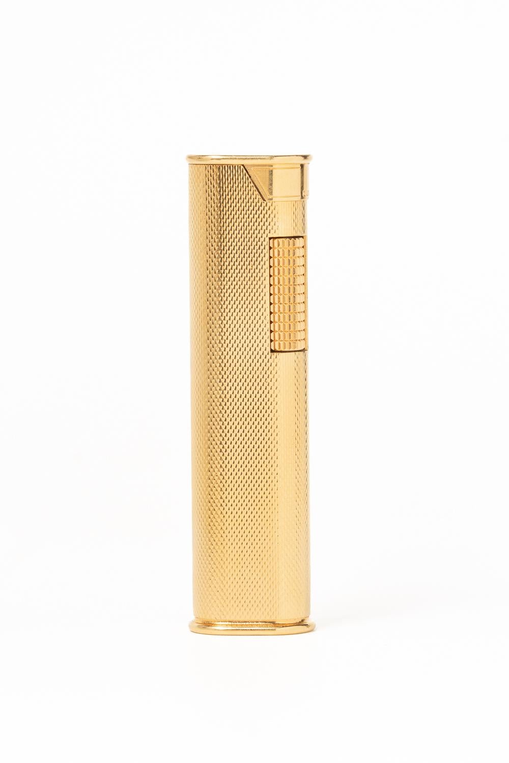 Very rare and elegant vintage Dunhill gold plated 'Slim' lighter This lighter was made in 1960's to 1970's as an evening lighter. Fit perfectly inside your jacket and it's great to handle. Stamped on the bottom. Great gift for very Dunhill's