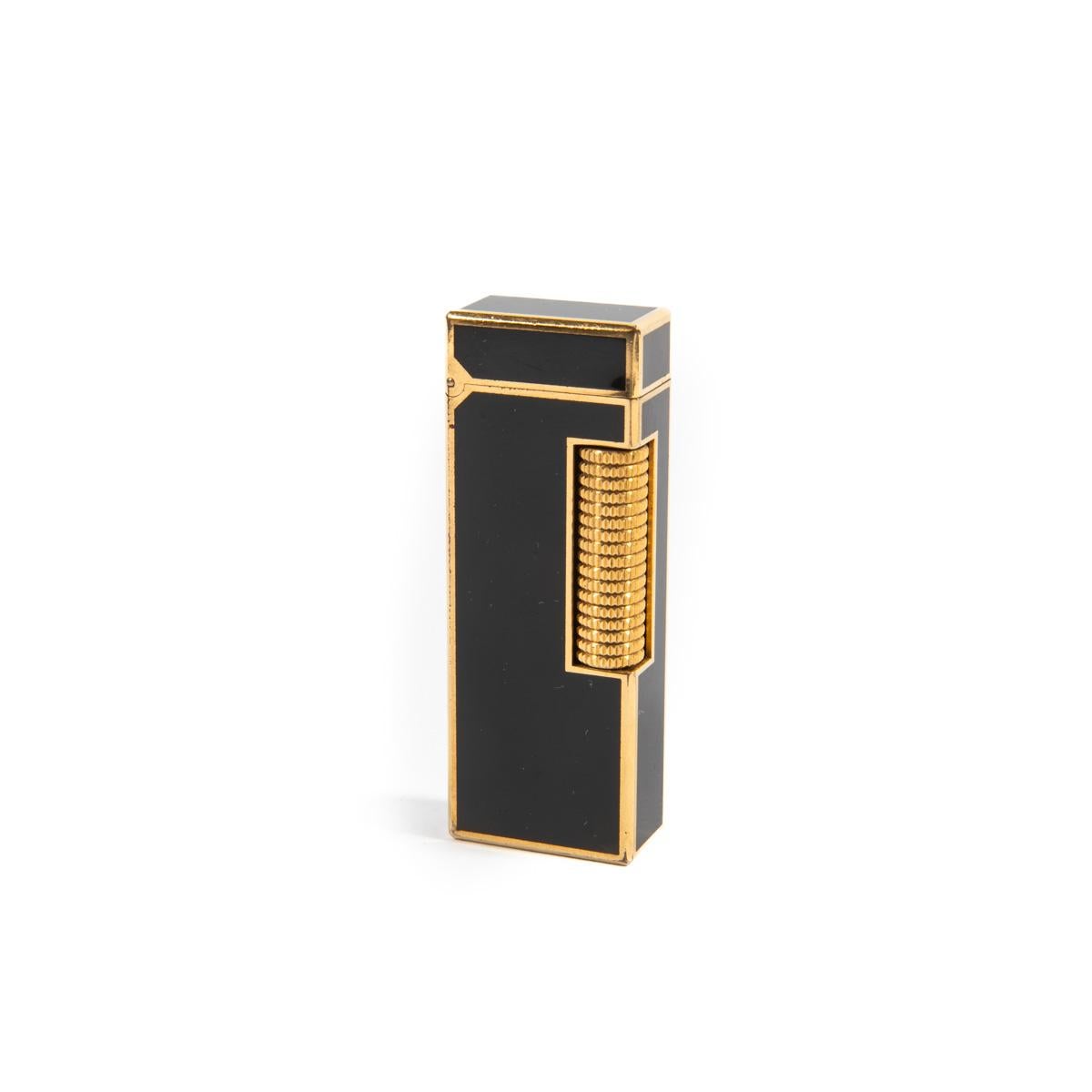 Vintage Dunhill Rollagas lighter Gold Plated 1980s

The iconic Dunhill name is known for quality, well-made cigarette lighters and other smoking implements. The company’s origin can be traced to Alfred Dunhill opening his first tobacco shop in