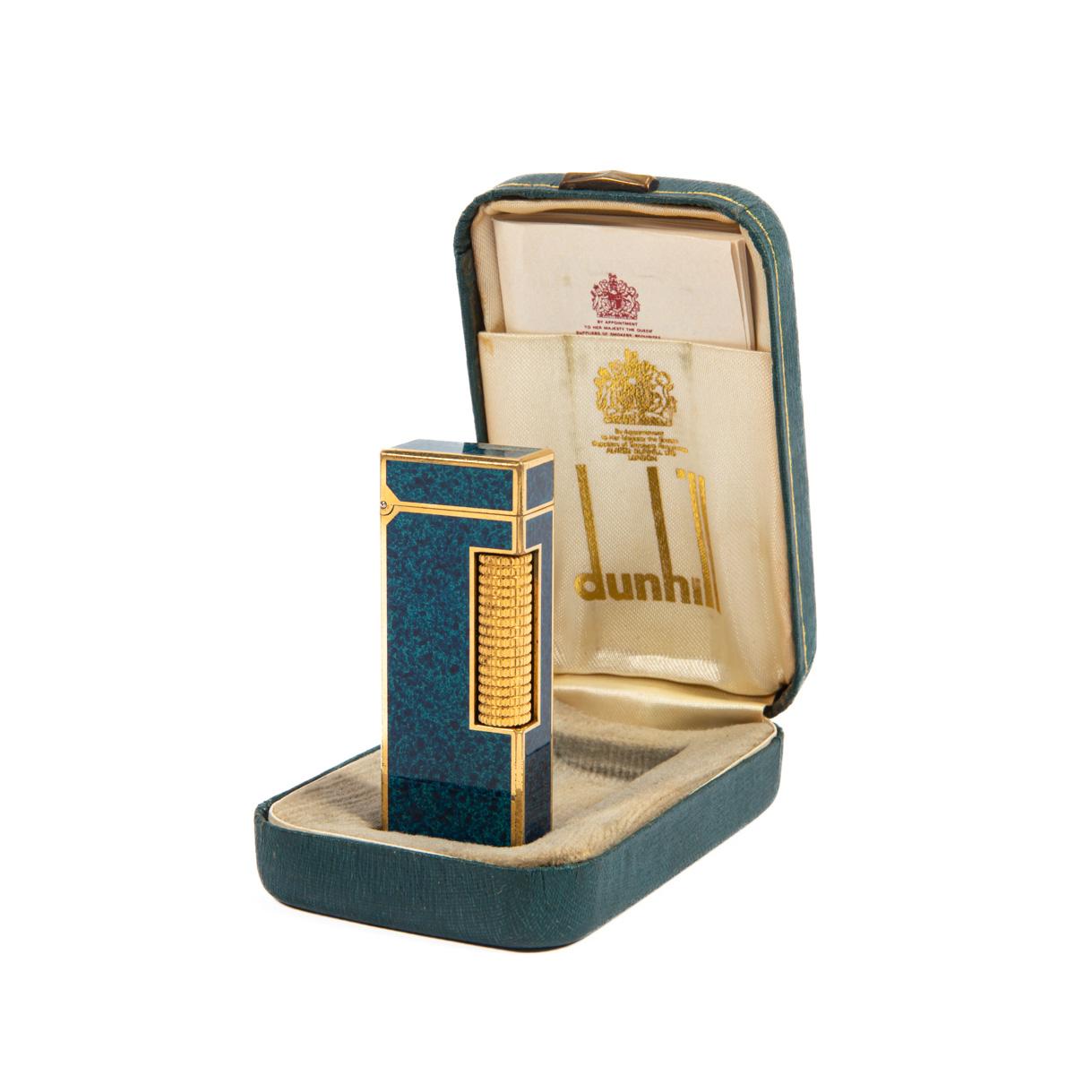 Vintage Dunhill Rollagas lighter Lapiz Lazuli Gold Plated In Box 1980s

The iconic Dunhill name is known for quality, well-made cigarette lighters and other smoking implements. The company’s origin can be traced to Alfred Dunhill opening his first