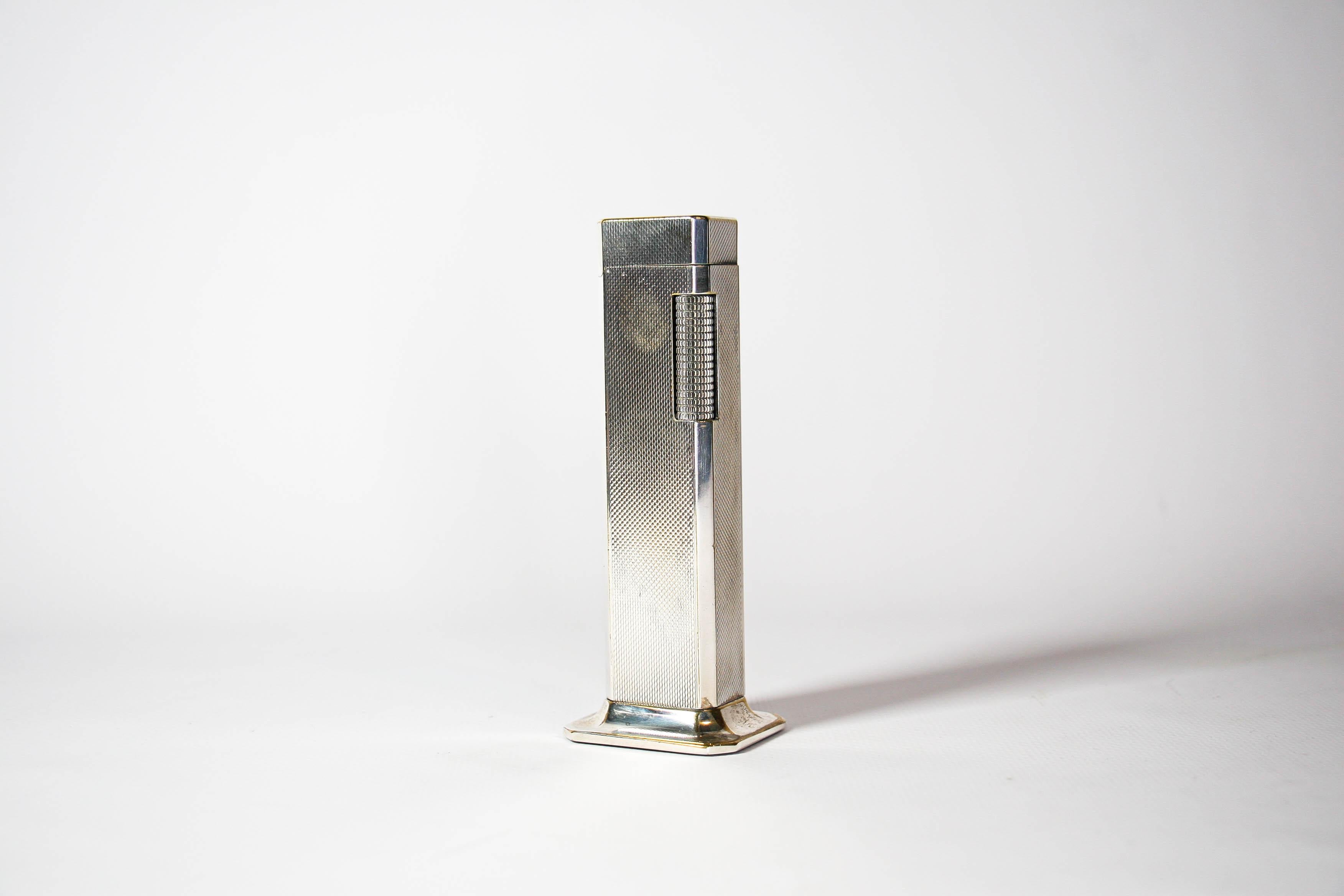 Vintage Dunhill Tallboy Table lighter Silver Plated 1970s

The iconic Dunhill name is known for quality, well-made cigarette lighters and other smoking implements. The company’s origin can be traced to Alfred Dunhill opening his first tobacco shop