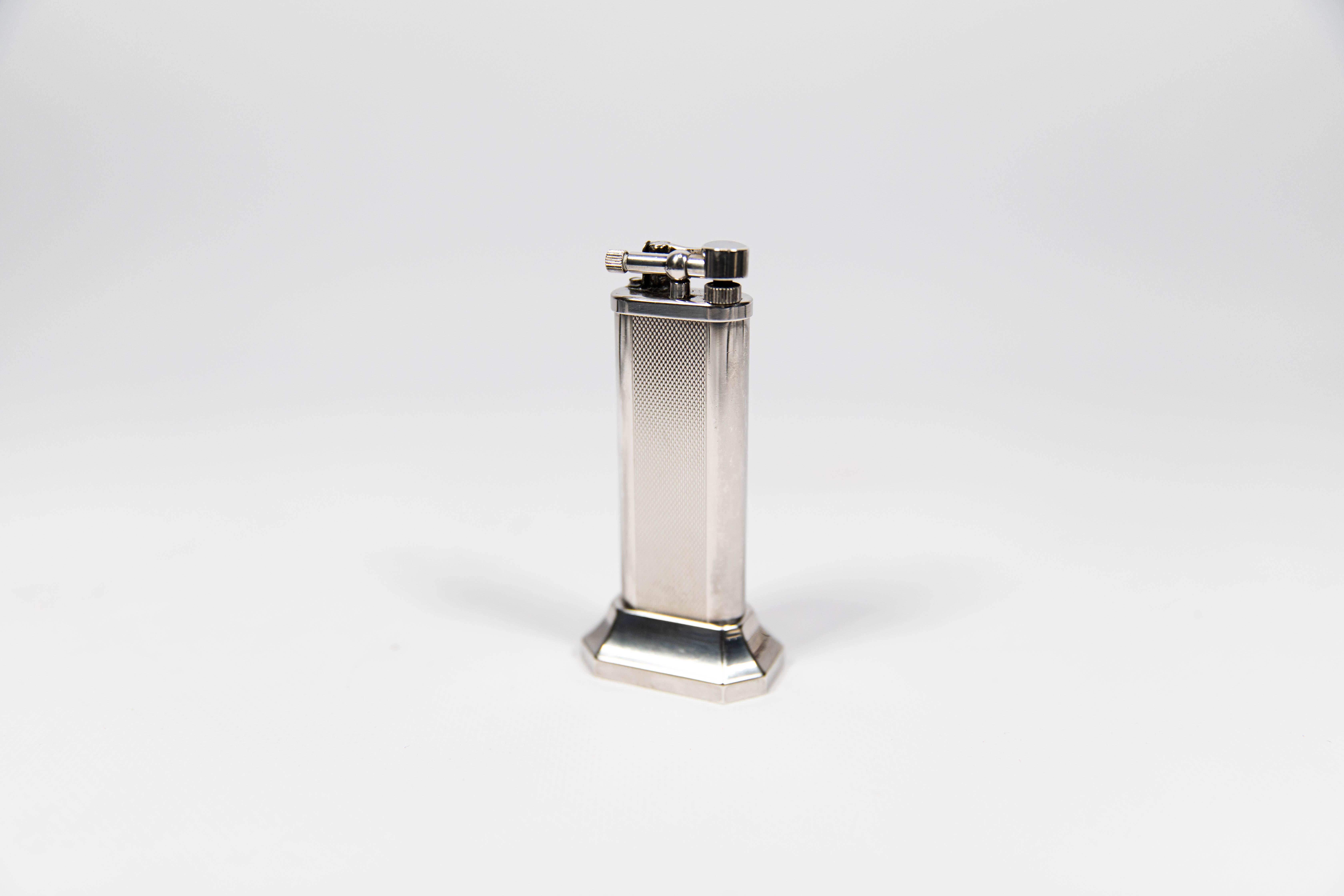 Vintage Dunhill Unique Table lighter Silver Plated 1970s

The iconic Dunhill name is known for quality, well-made cigarette lighters and other smoking implements. The company’s origin can be traced to Alfred Dunhill opening his first tobacco shop in