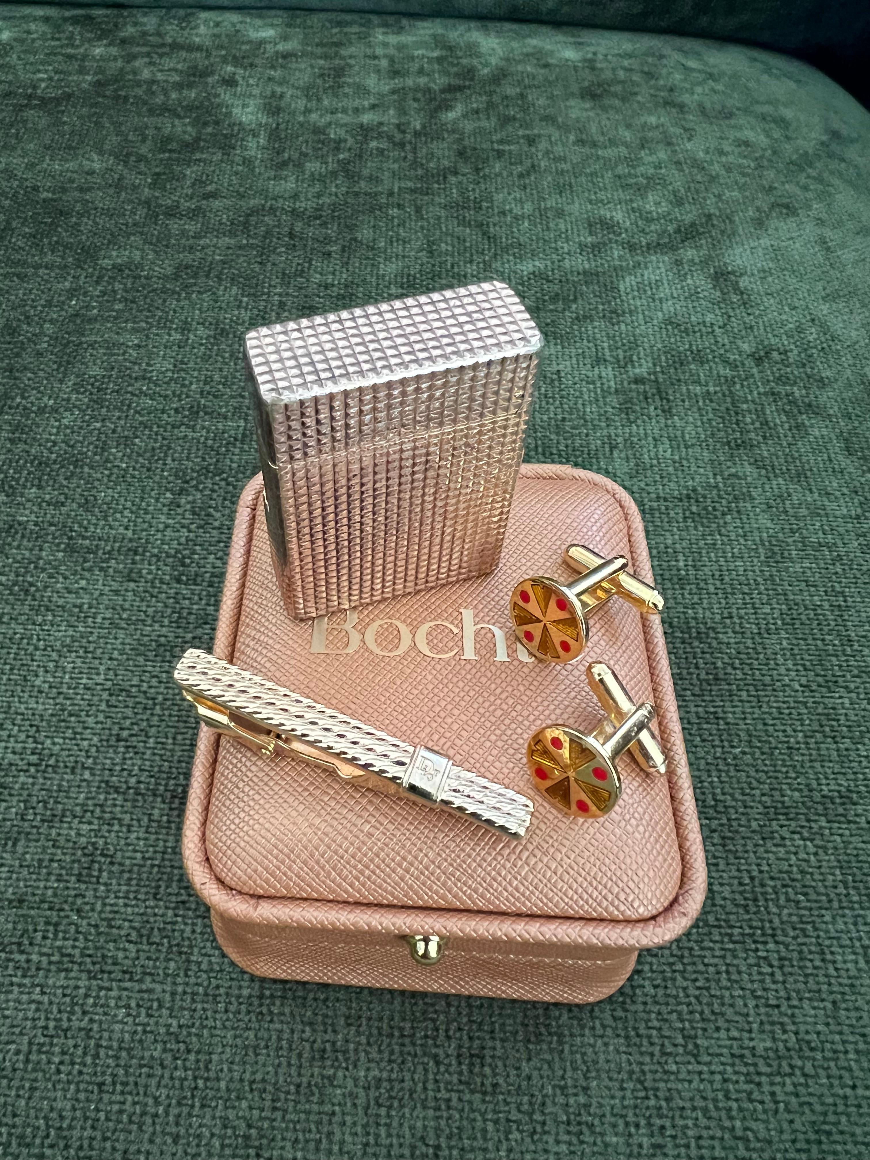 Vintage Dupont Rose Gold Plated Lighter
British Heritage Cufflinks 
& Dior Neck Tie Gift Set 
“Circa 1970”

Vintage Dior Gold Plate Neck Tie 
Luxury brands like Dior typically sell products that have high manufacturing costs. Not only do quality raw