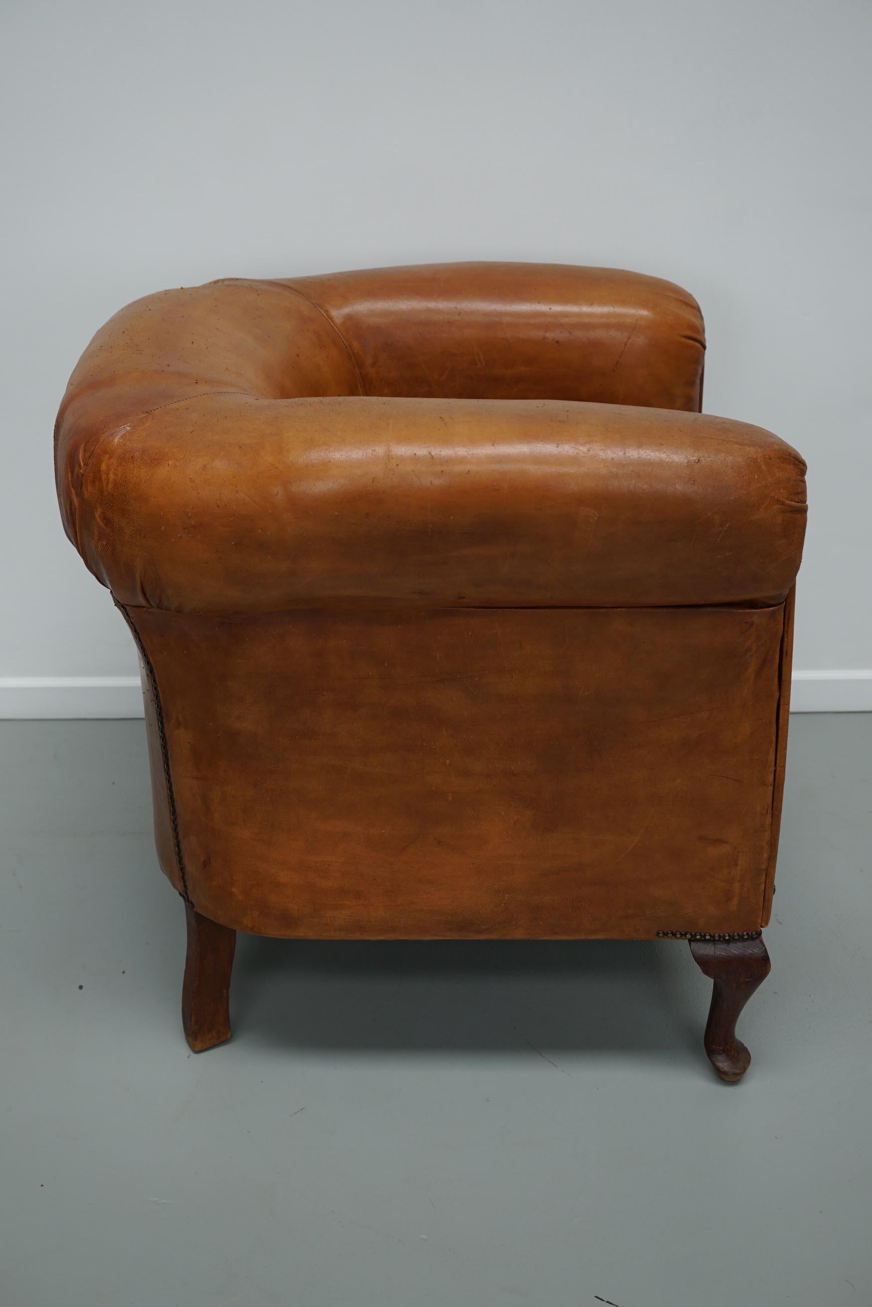 Cognacfarbener Clubsessel aus Leder im Angebot 5
