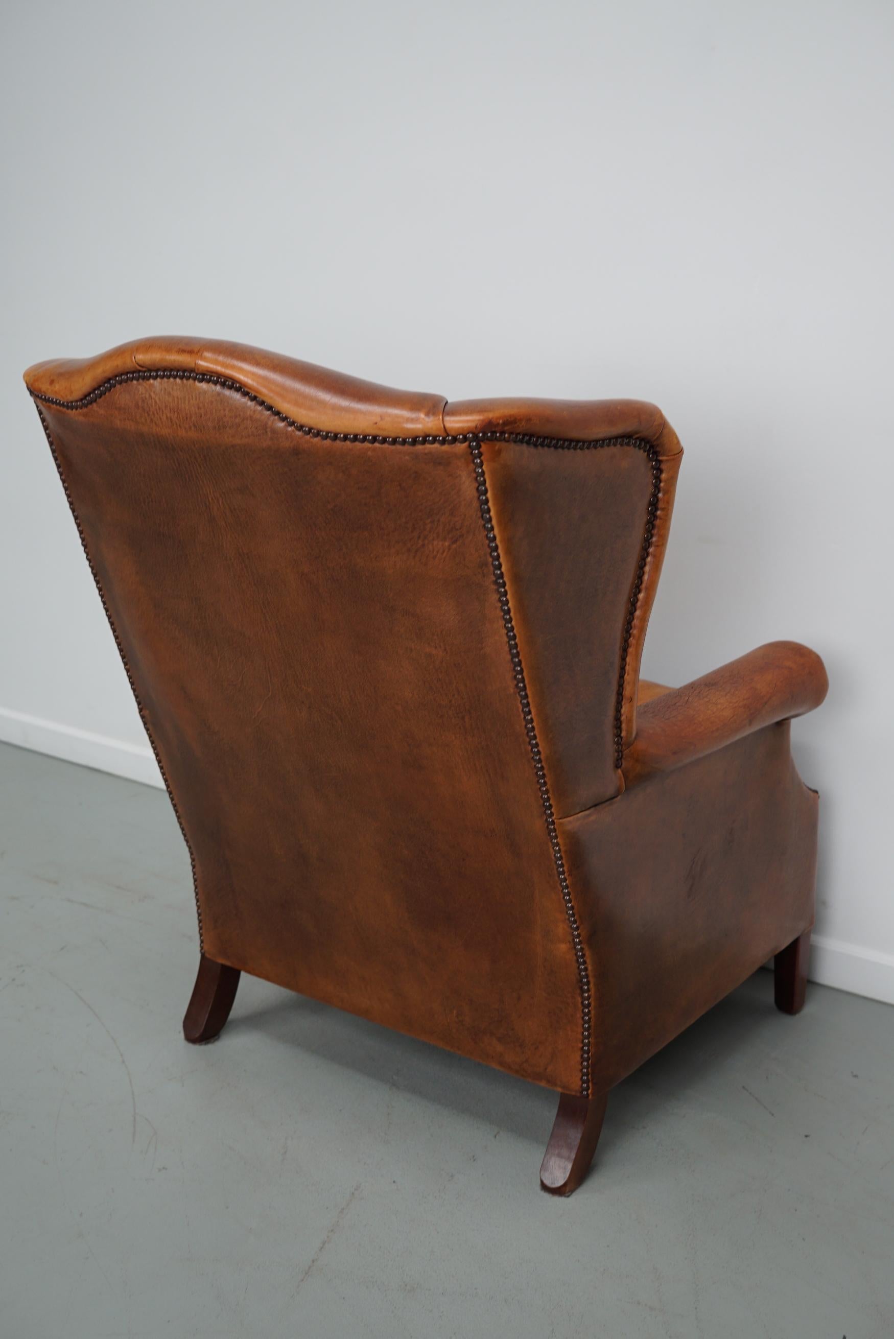 Cognacfarbener Clubsessel aus Leder im Angebot 5