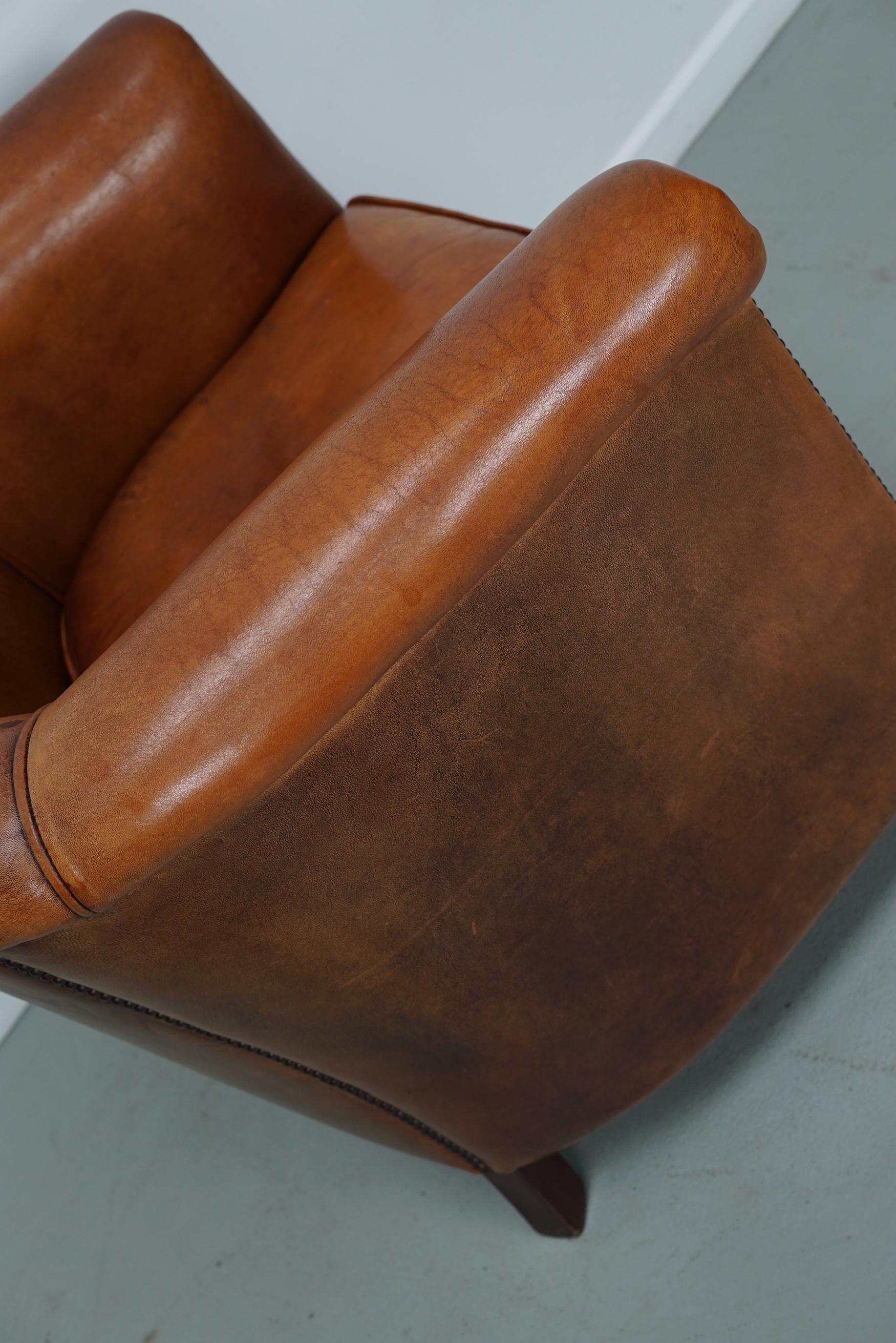 Cognacfarbener Clubsessel aus Leder im Angebot 5