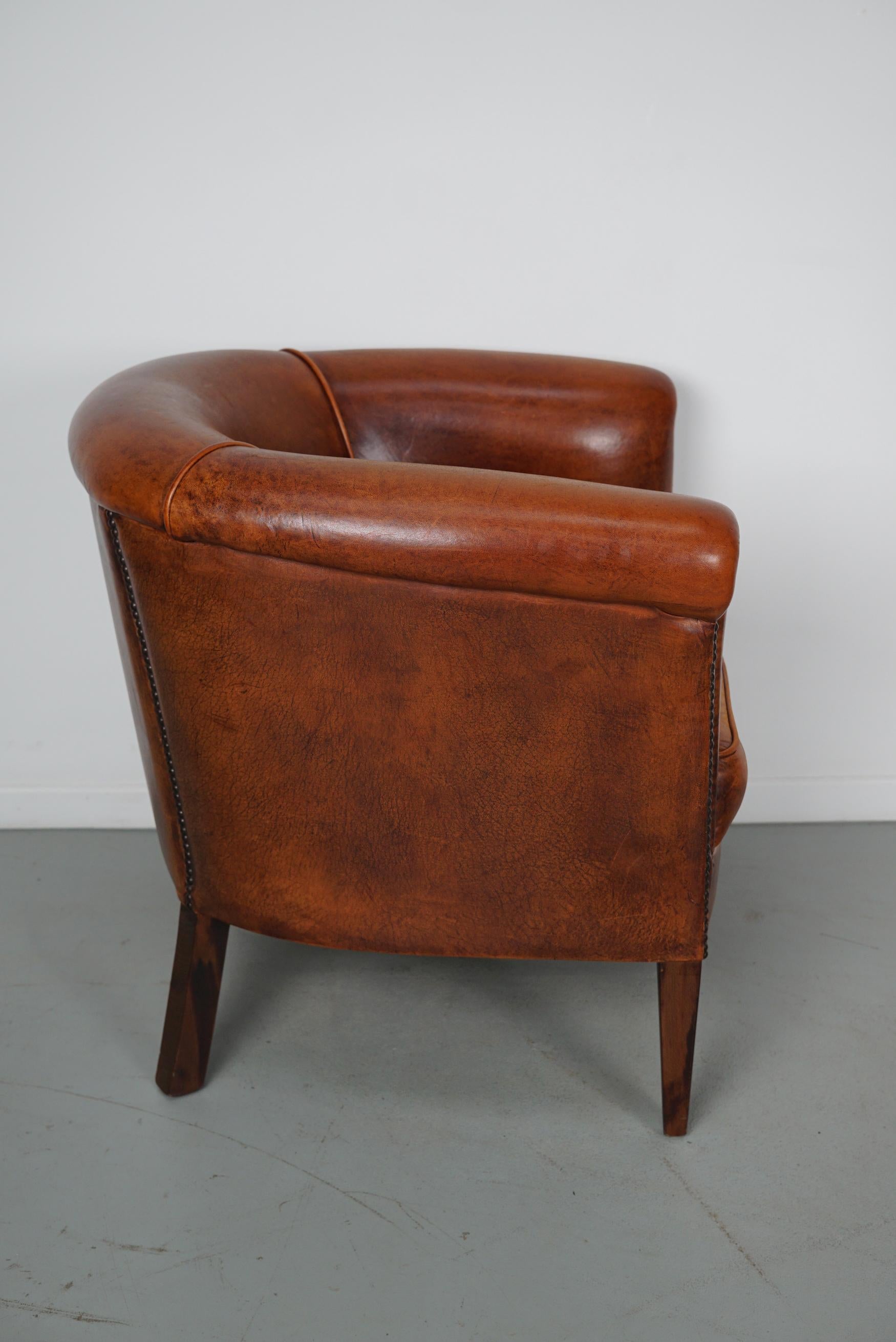 Cognacfarbener Clubsessel aus Leder im Angebot 6
