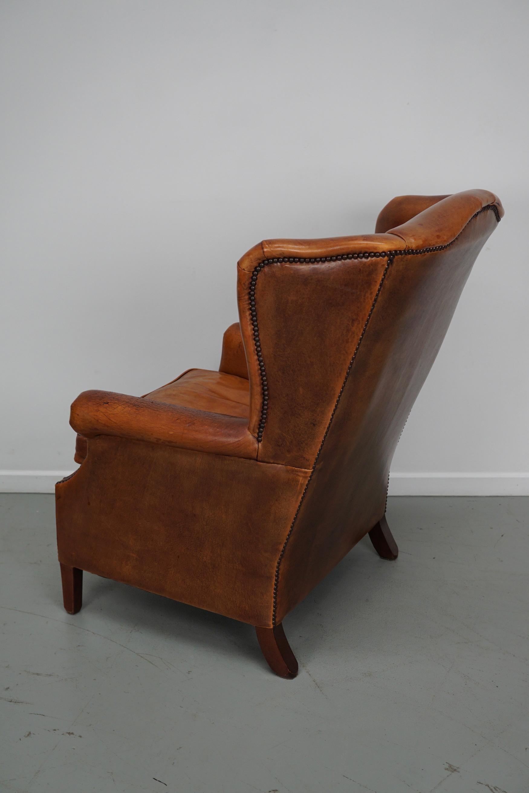 Cognacfarbener Clubsessel aus Leder im Angebot 6