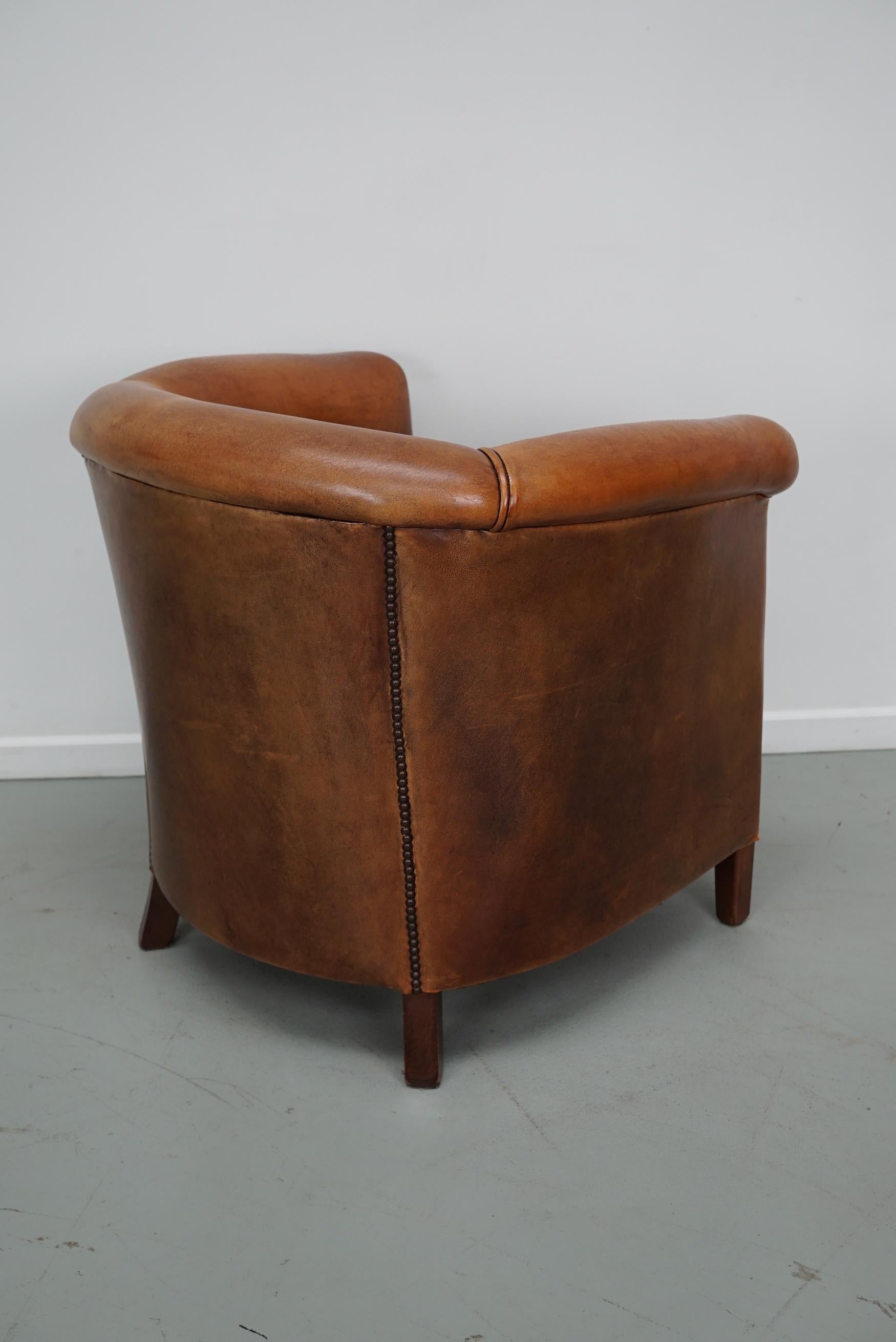 Cognacfarbener Clubsessel aus Leder im Angebot 6
