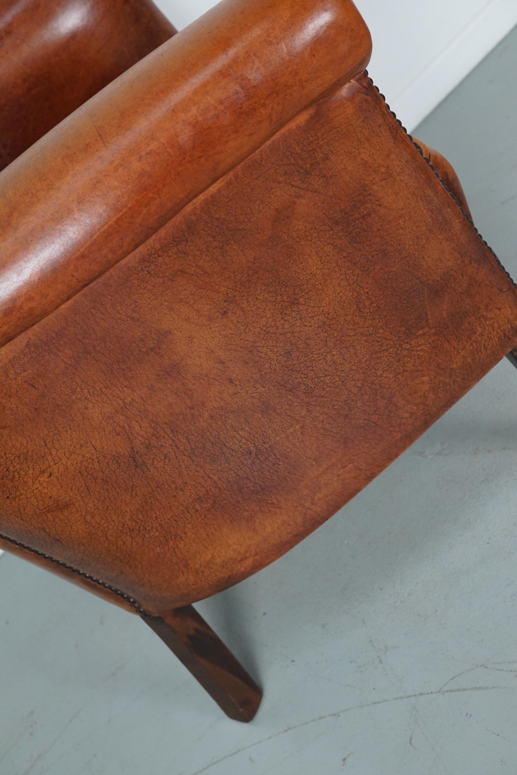 Cognacfarbener Clubsessel aus Leder im Angebot 7