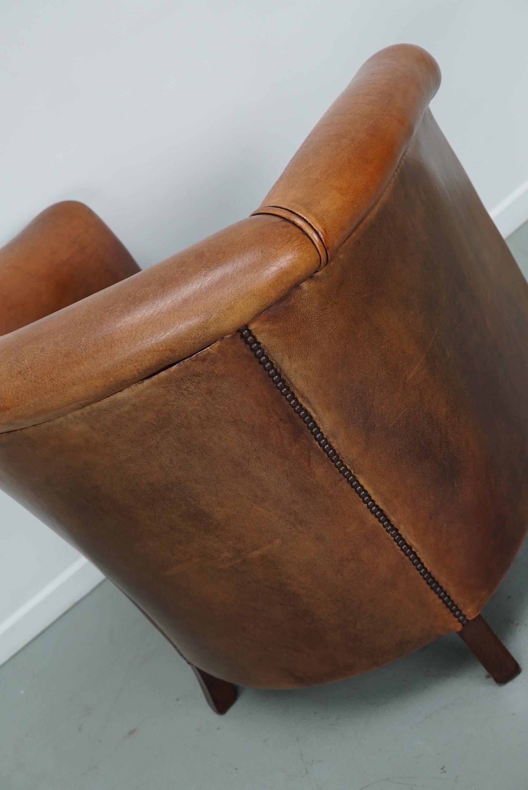 Cognacfarbener Clubsessel aus Leder im Angebot 7