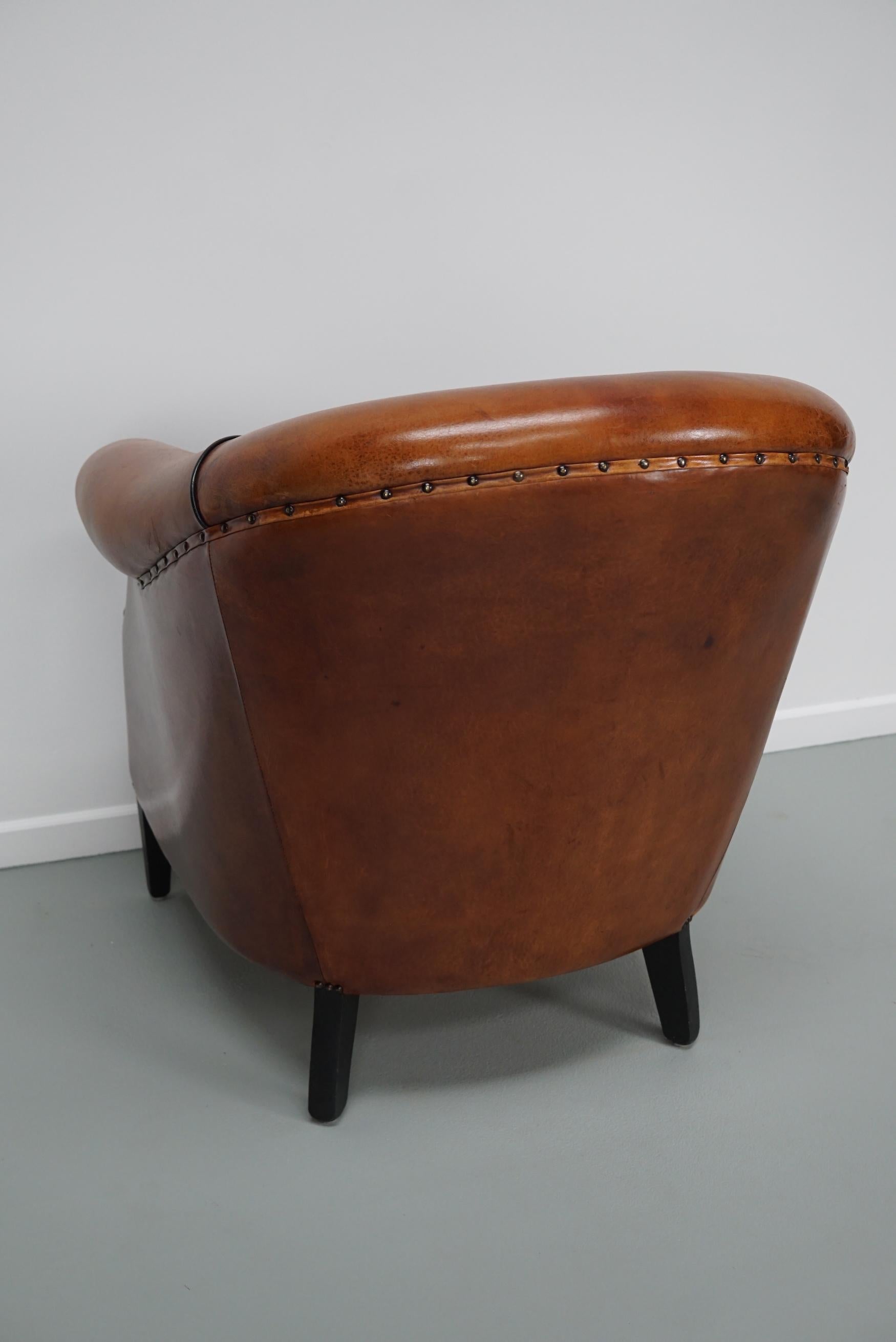 Cognacfarbener Clubsessel aus Leder im Angebot 8