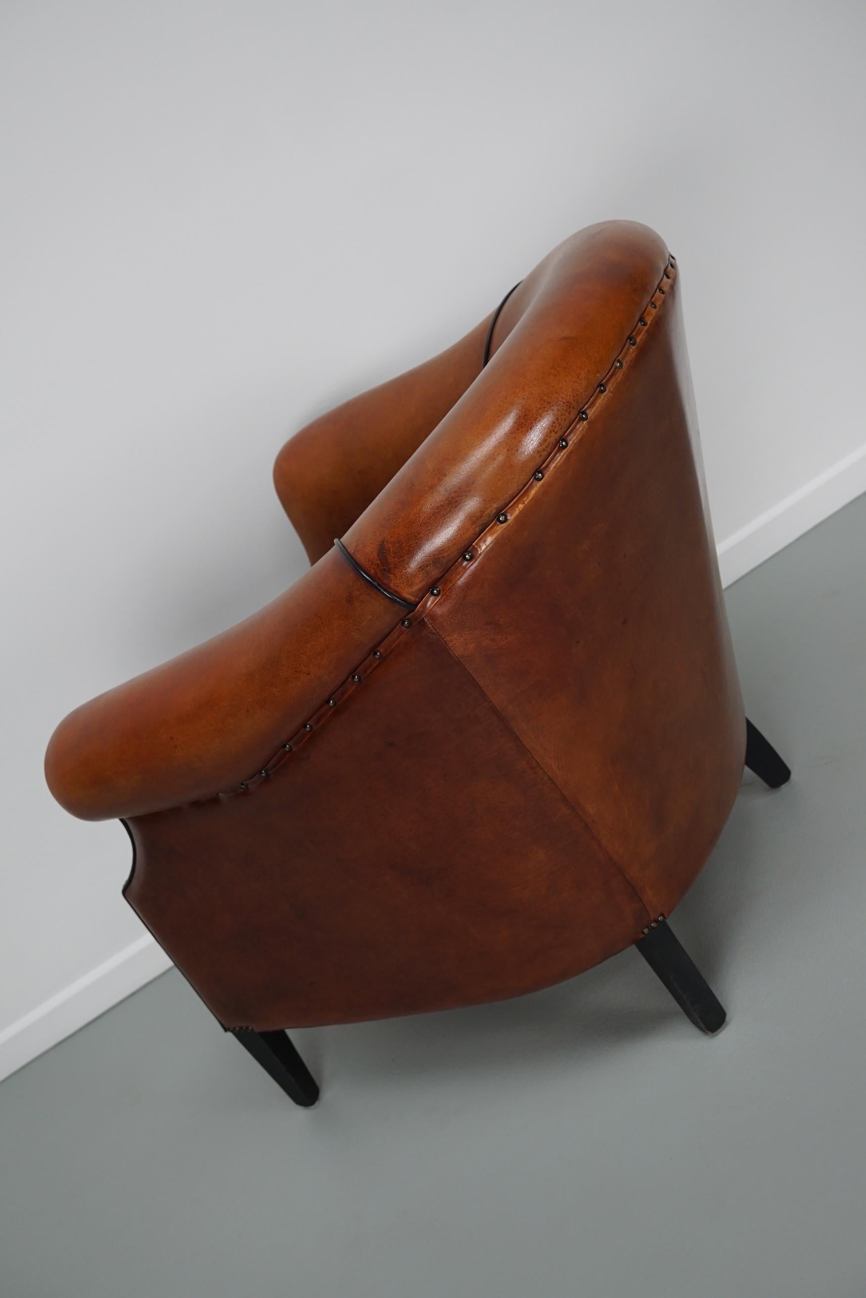 Cognacfarbener Clubsessel aus Leder im Angebot 10