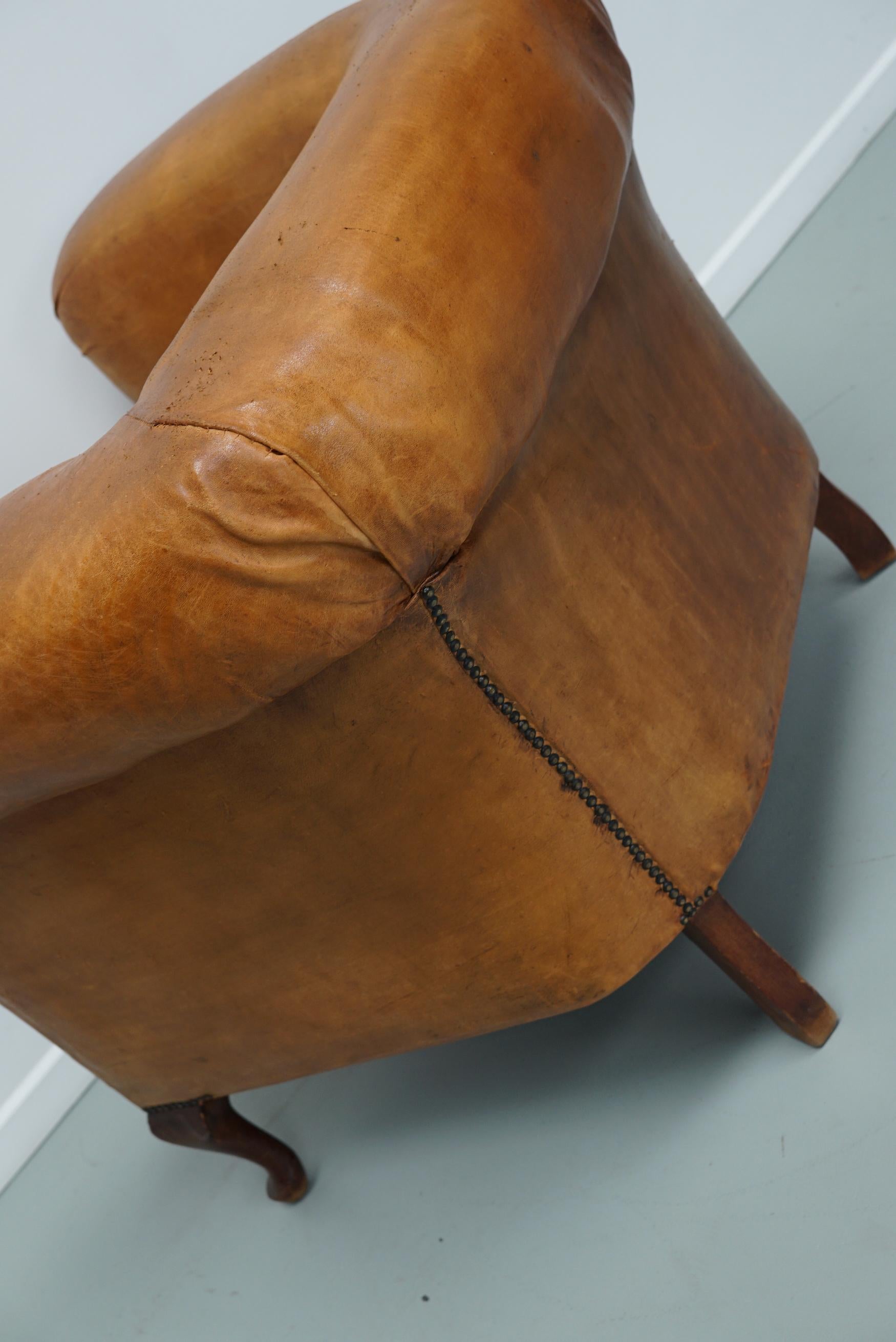 Cognacfarbener Clubsessel aus Leder im Angebot 12