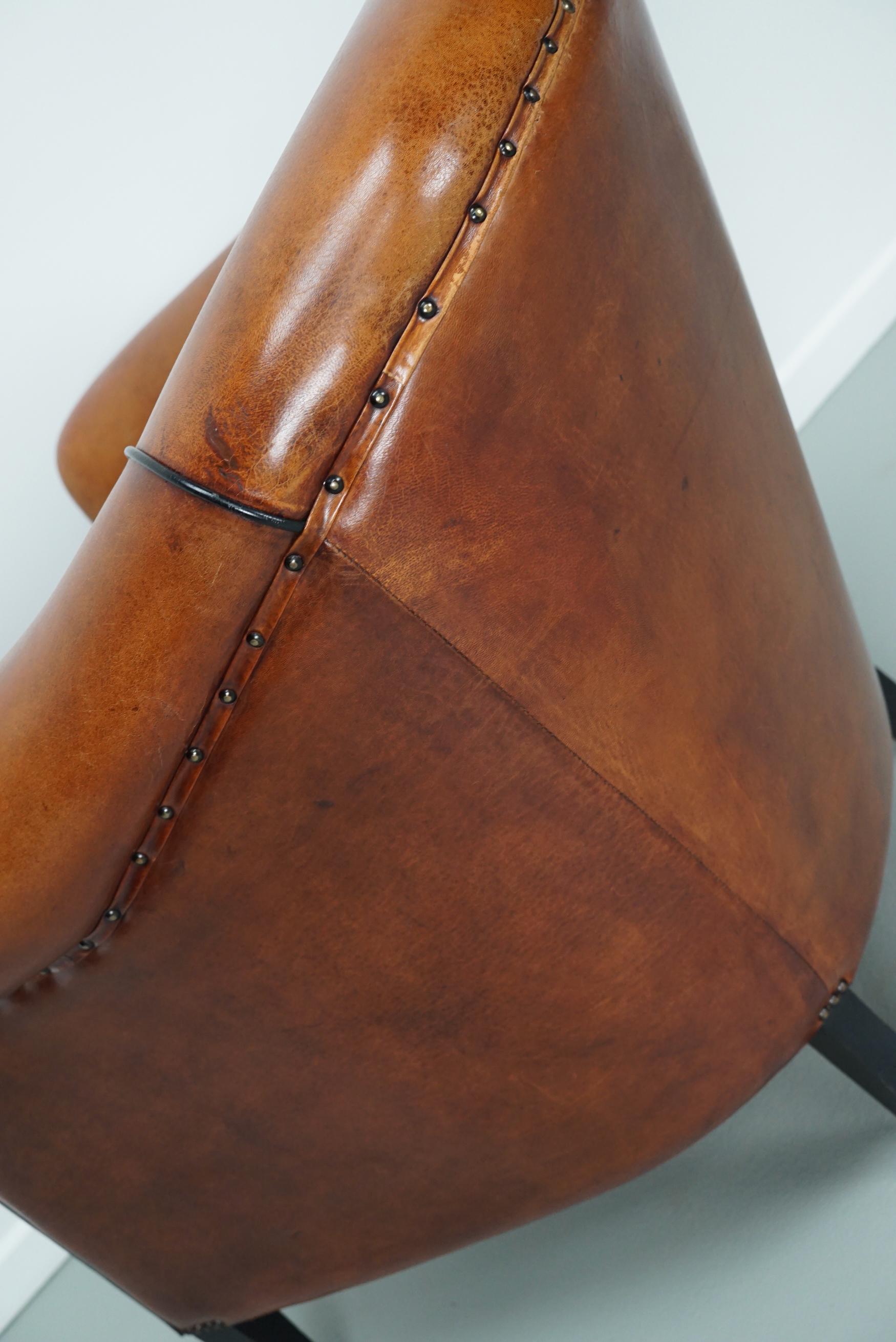 Cognacfarbener Clubsessel aus Leder im Angebot 12