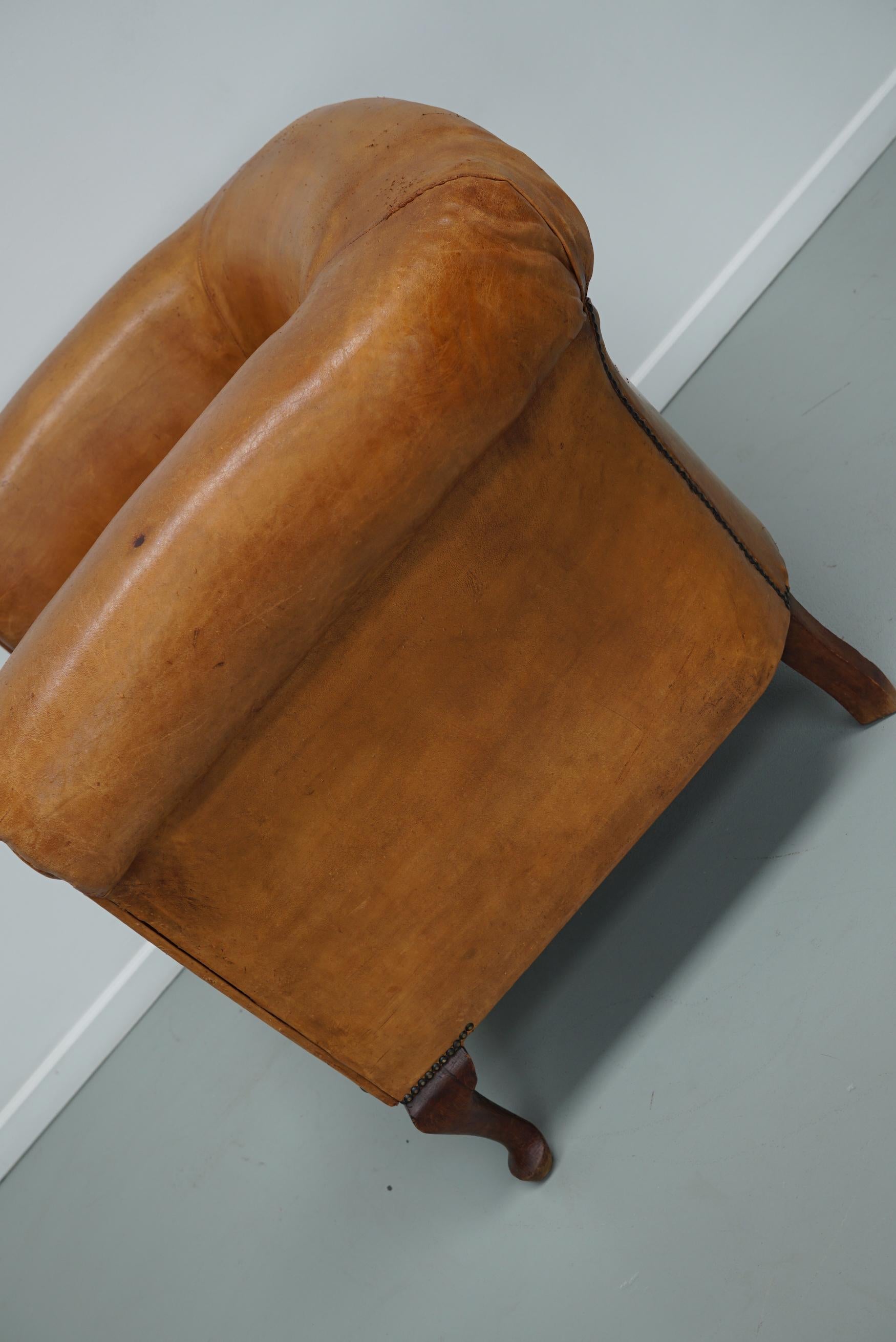 Cognacfarbener Clubsessel aus Leder im Angebot 14