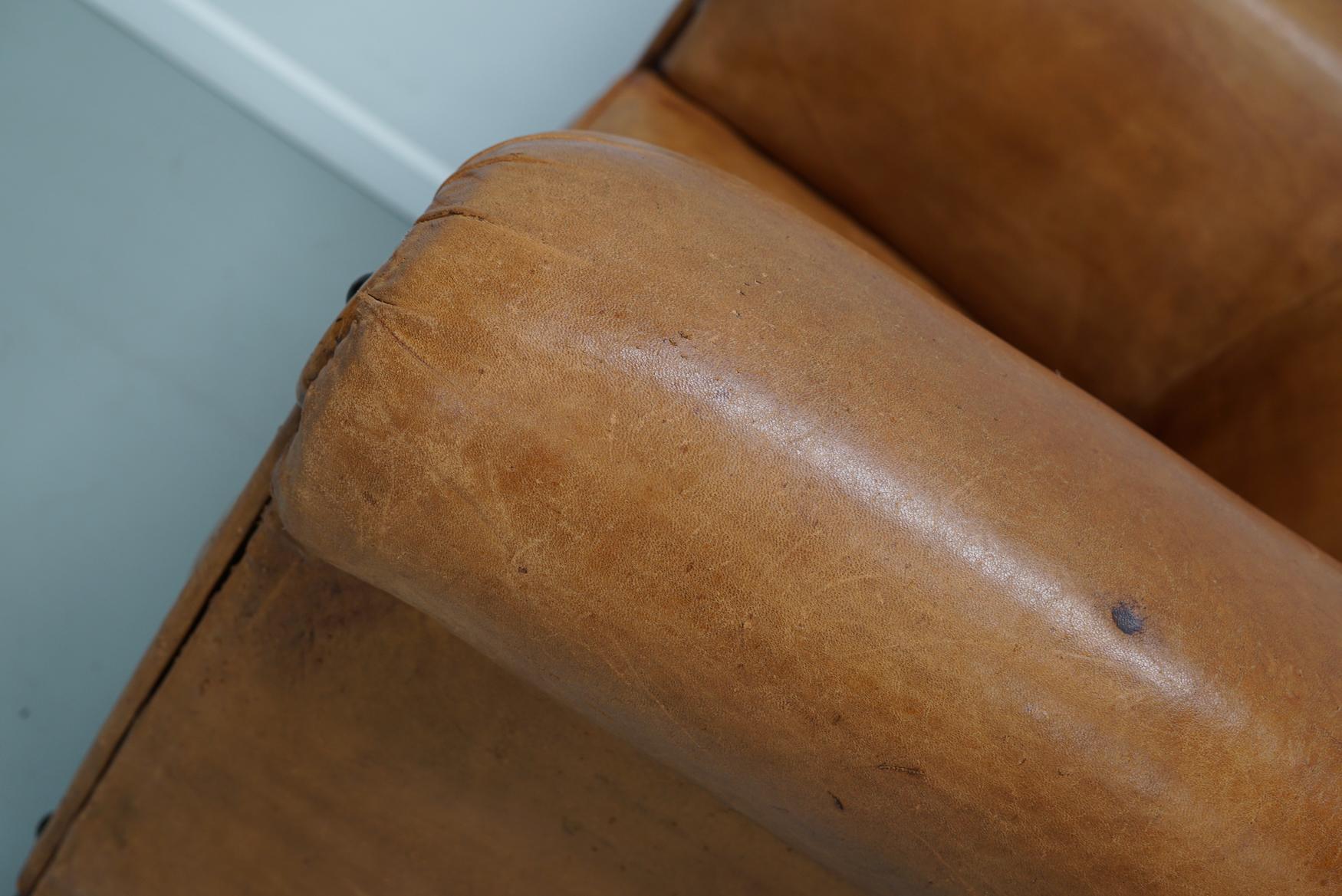 Cognacfarbener Clubsessel aus Leder im Angebot 15