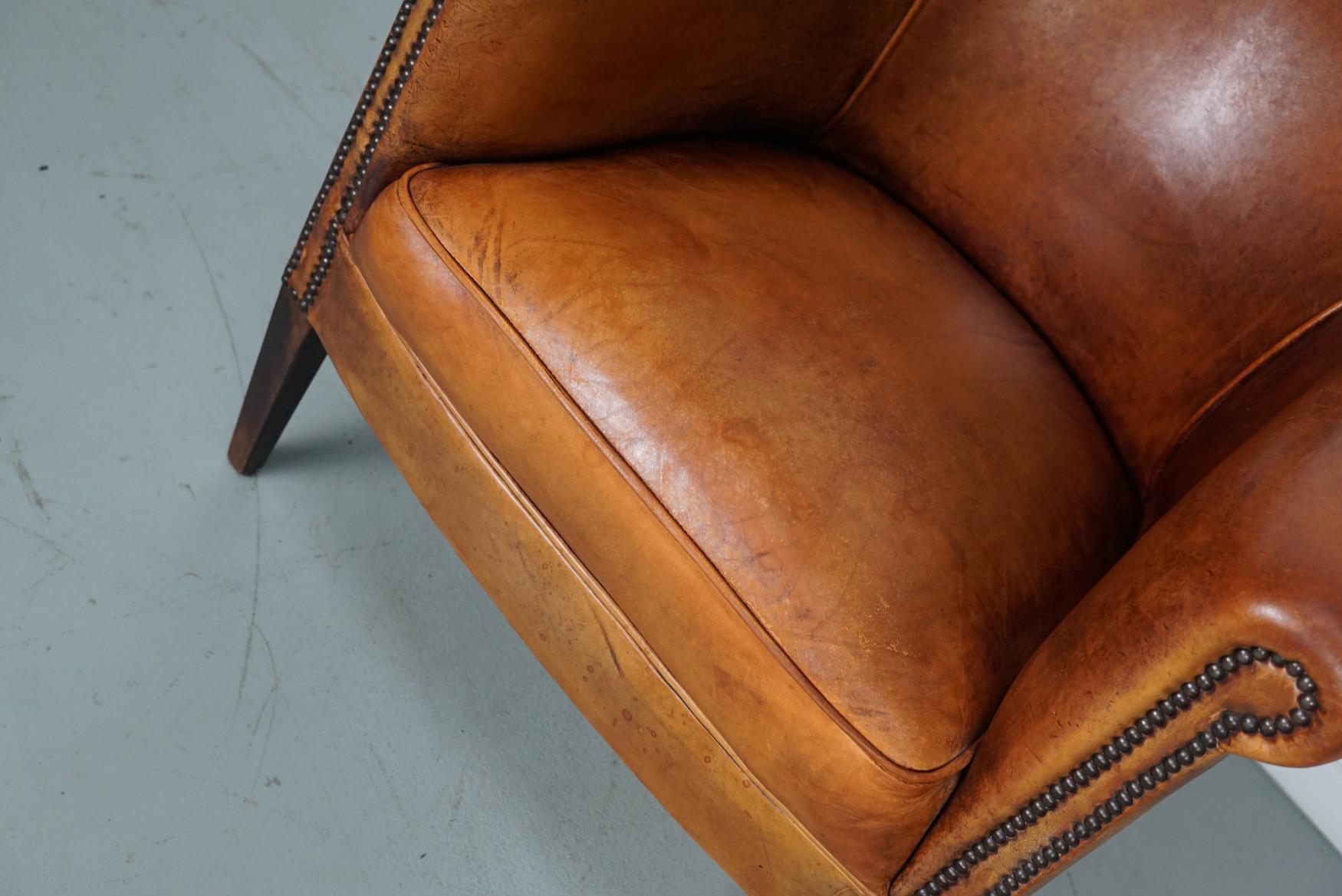 Cognacfarbener Clubsessel aus Leder (Ende des 20. Jahrhunderts) im Angebot
