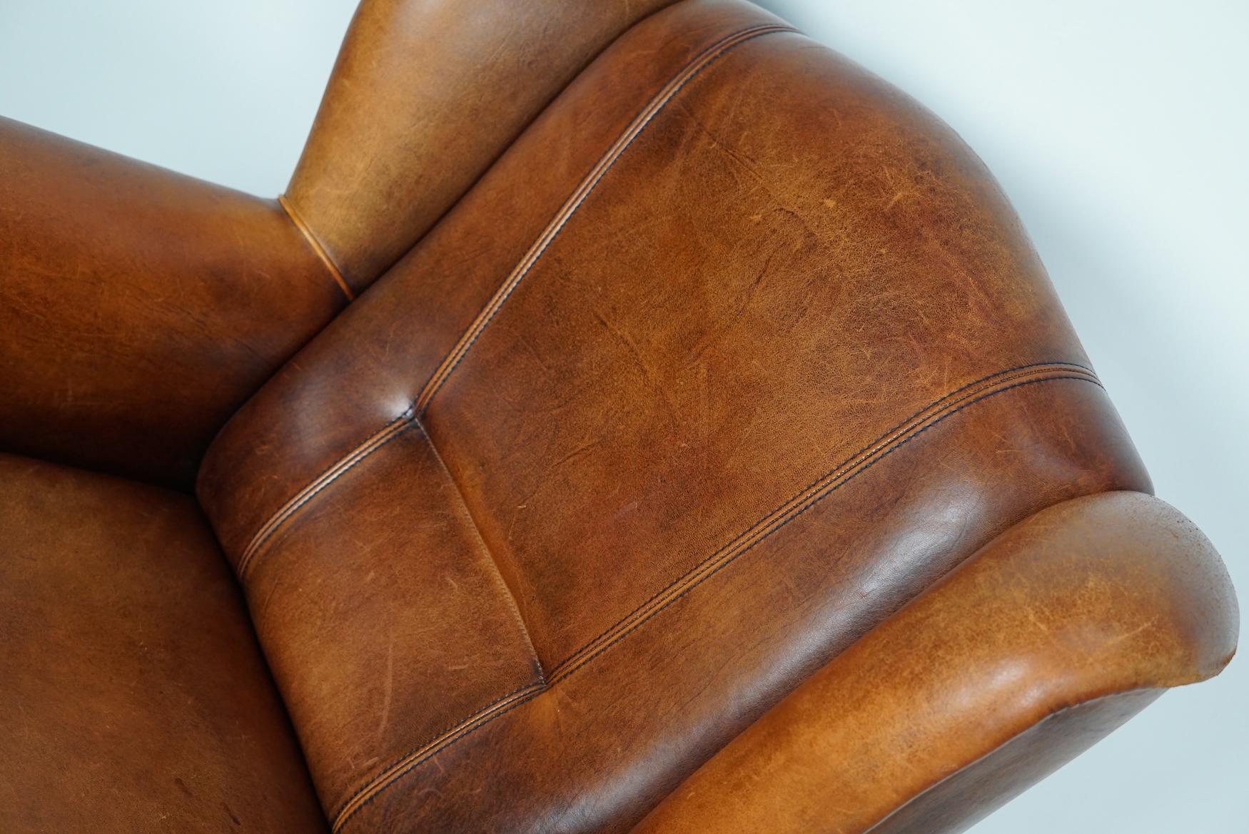 Cognacfarbener Clubsessel aus Leder (Ende des 20. Jahrhunderts) im Angebot
