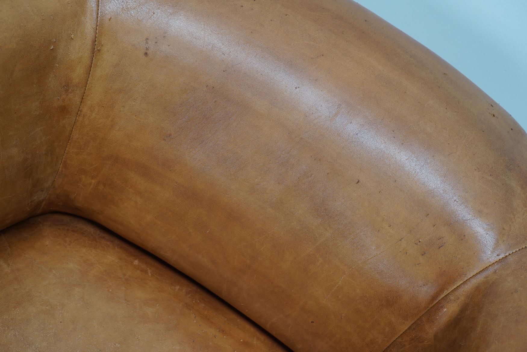 Cognacfarbener Clubsessel aus Leder im Angebot 1