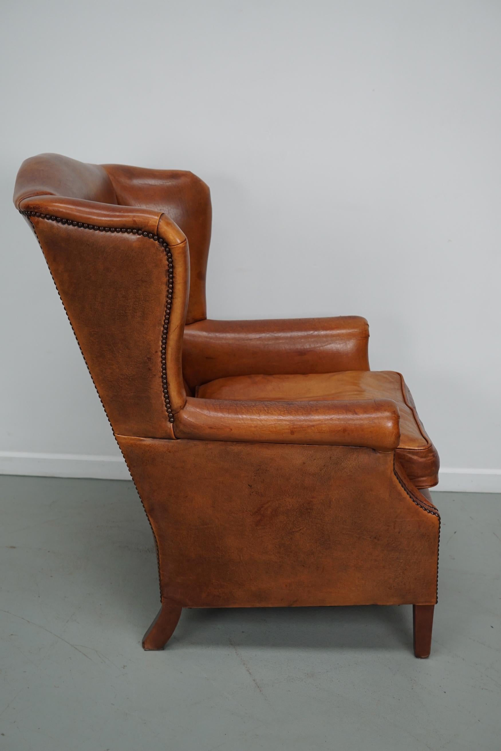 Cognacfarbener Clubsessel aus Leder im Angebot 1