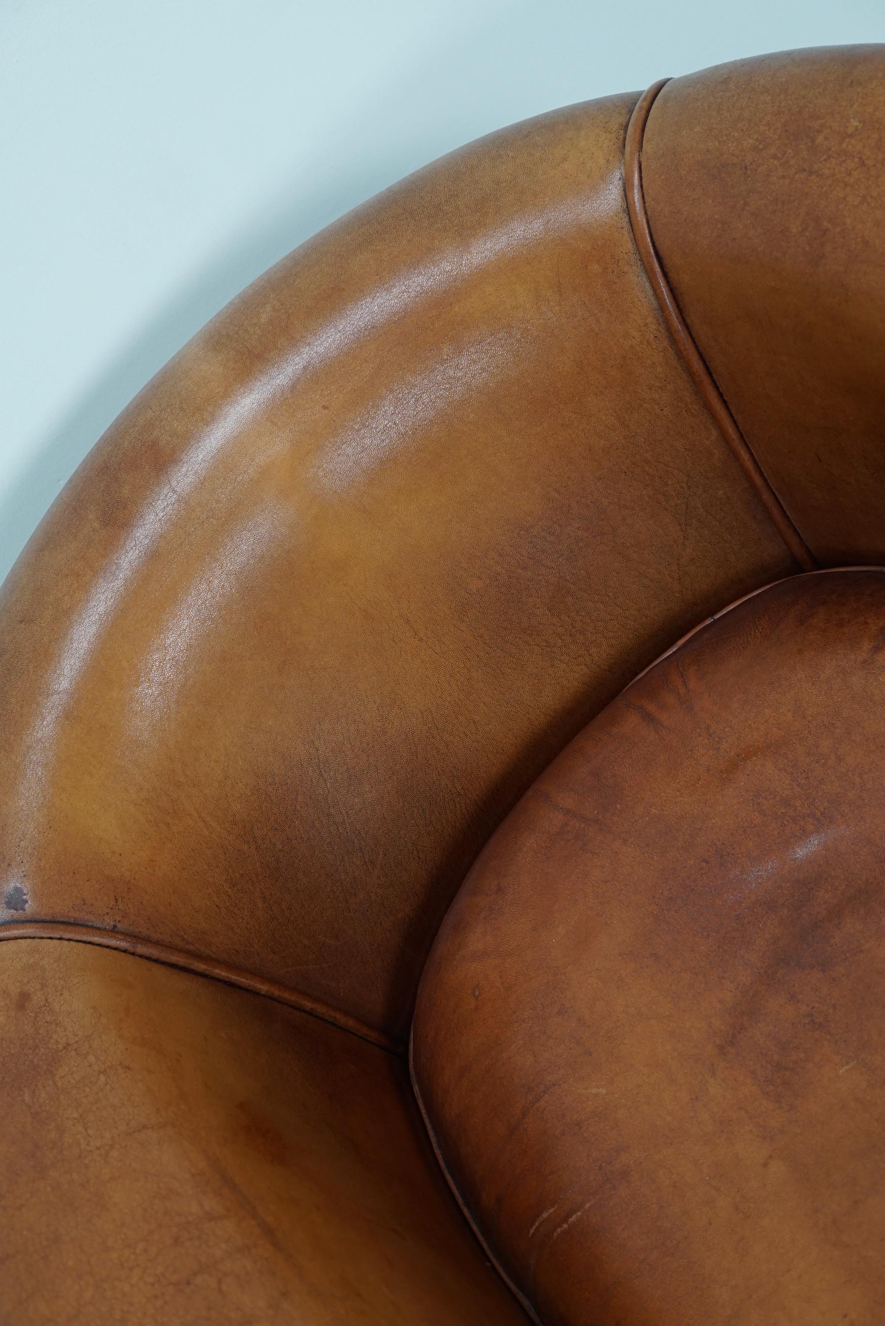Cognacfarbener Clubsessel aus Leder im Angebot 1