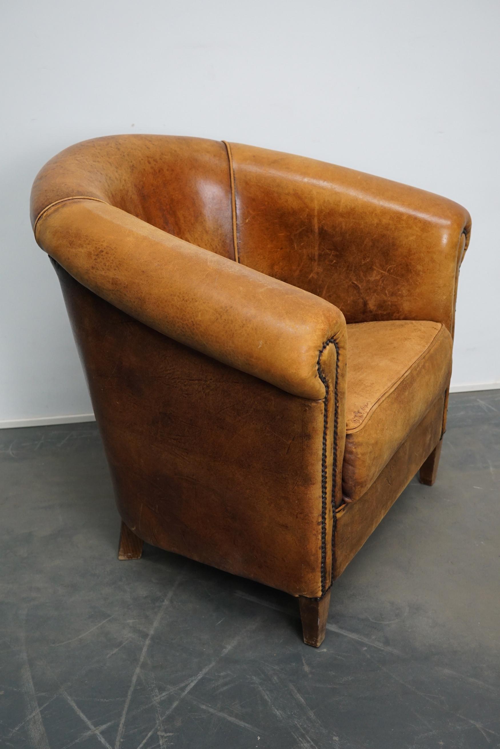 Cuir Fauteuil club néerlandais vintage en cuir de couleur cognac en vente