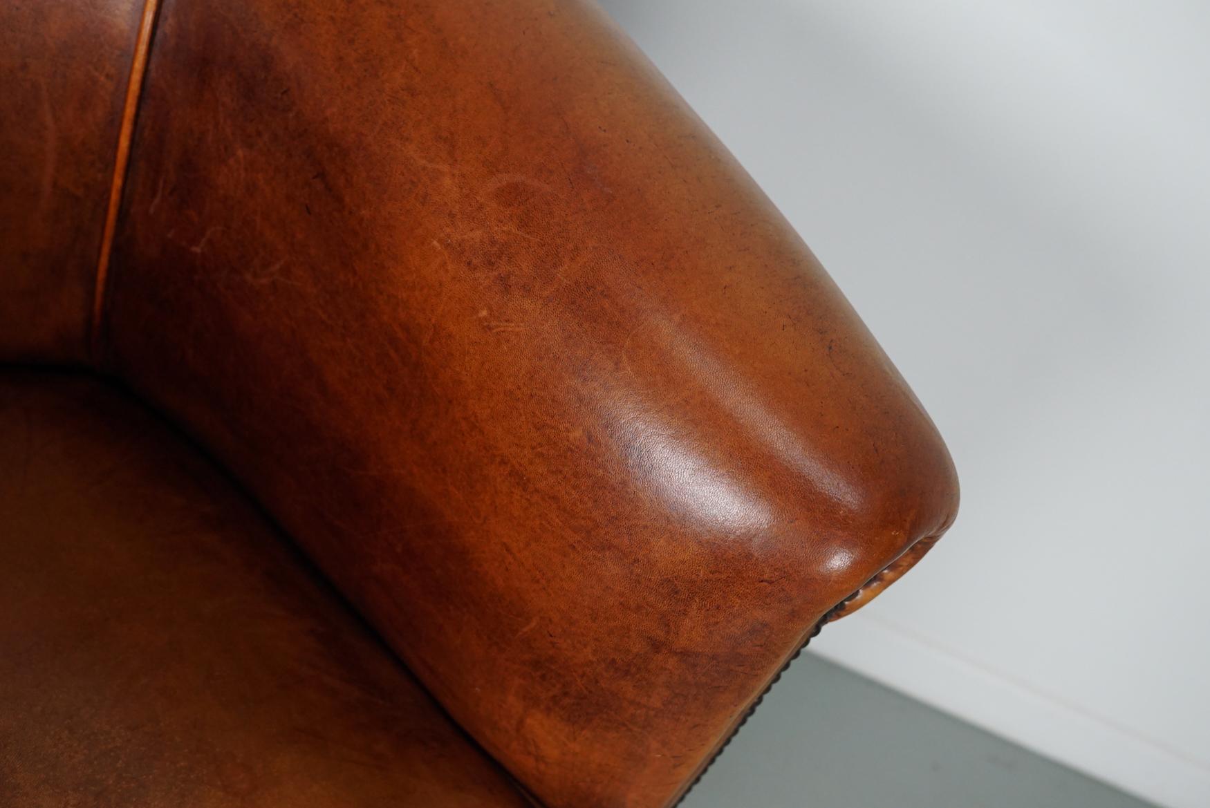 Cognacfarbener Clubsessel aus Leder im Angebot 2