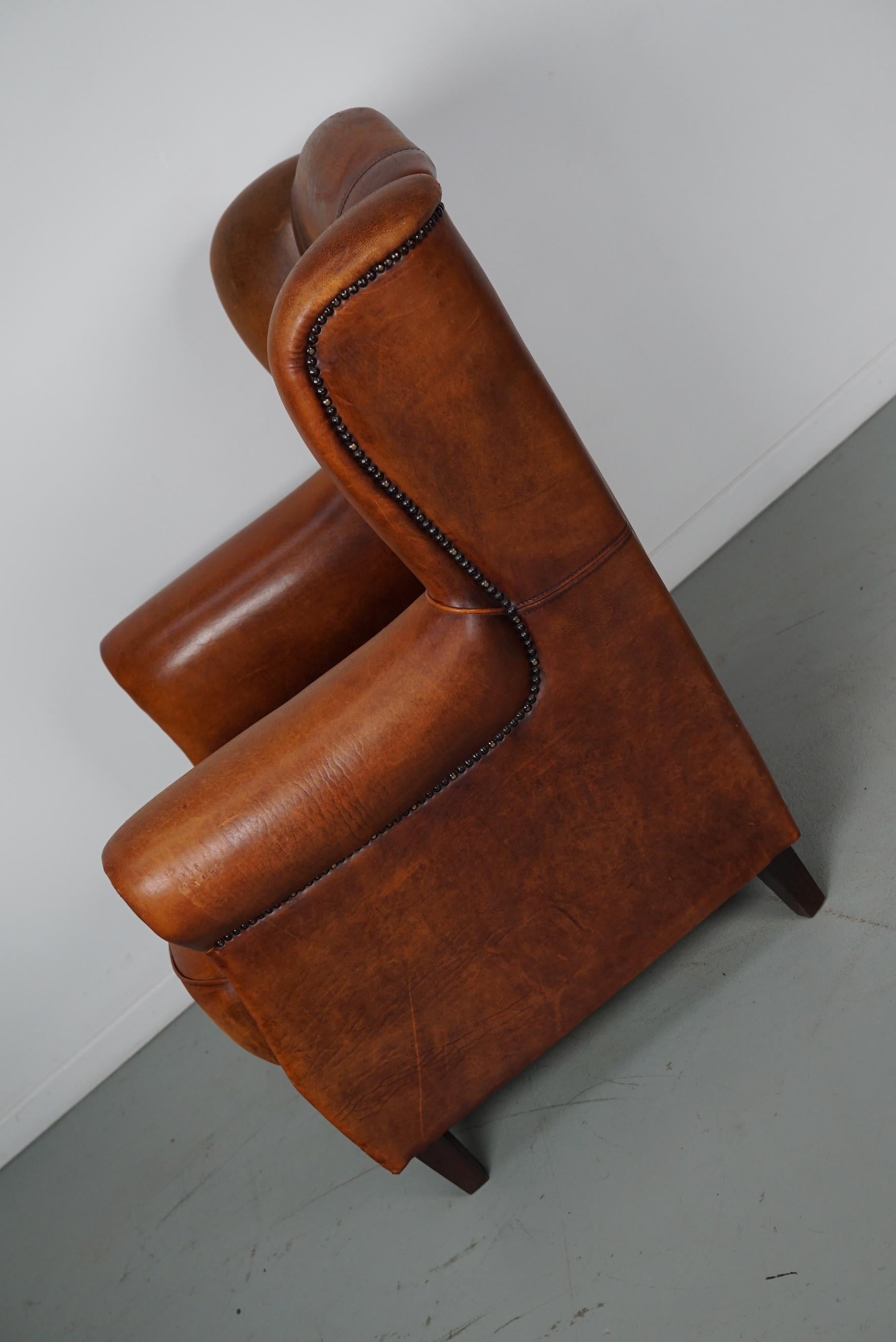 Cognacfarbener Clubsessel aus Leder im Angebot 2