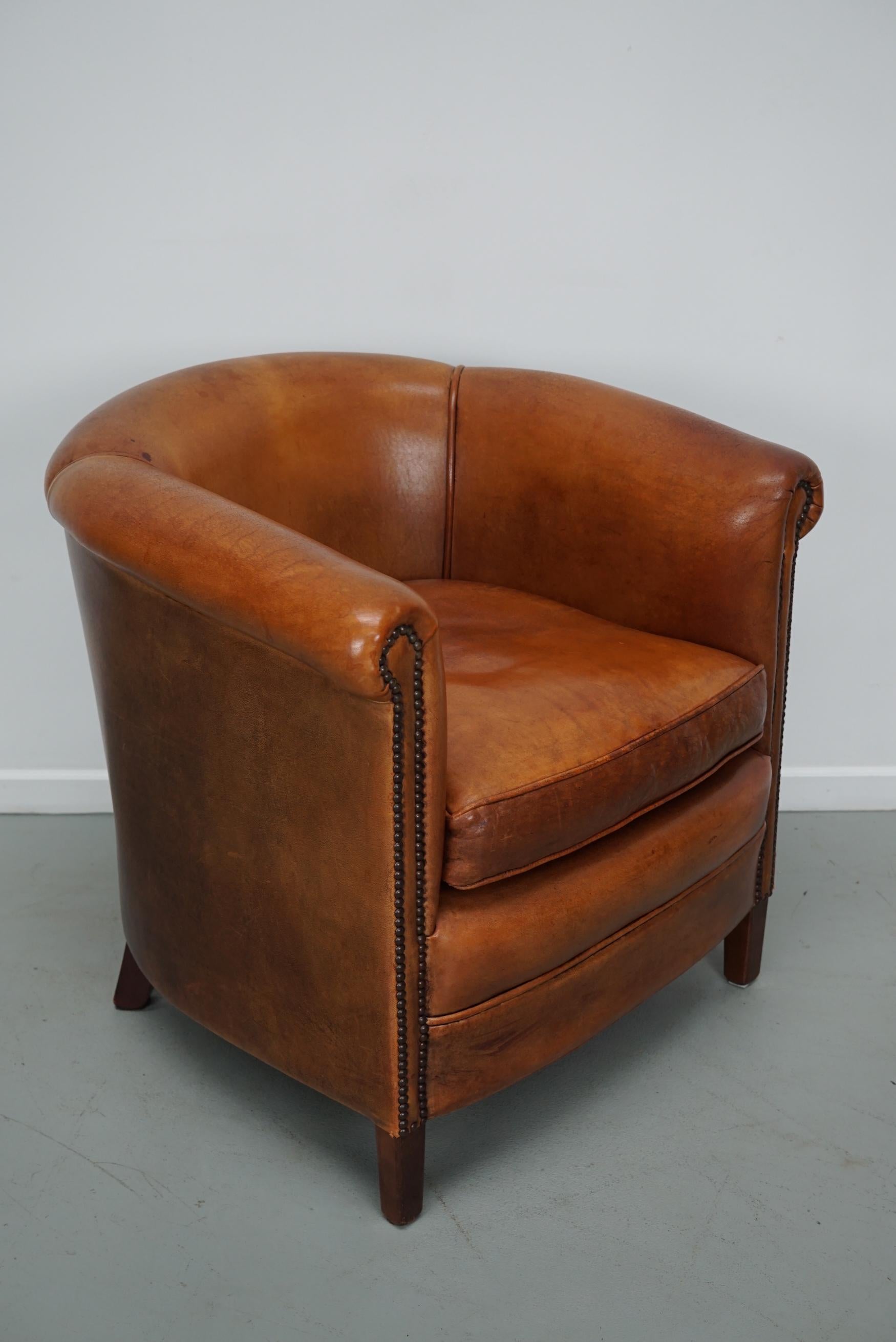 Cognacfarbener Clubsessel aus Leder im Angebot 2