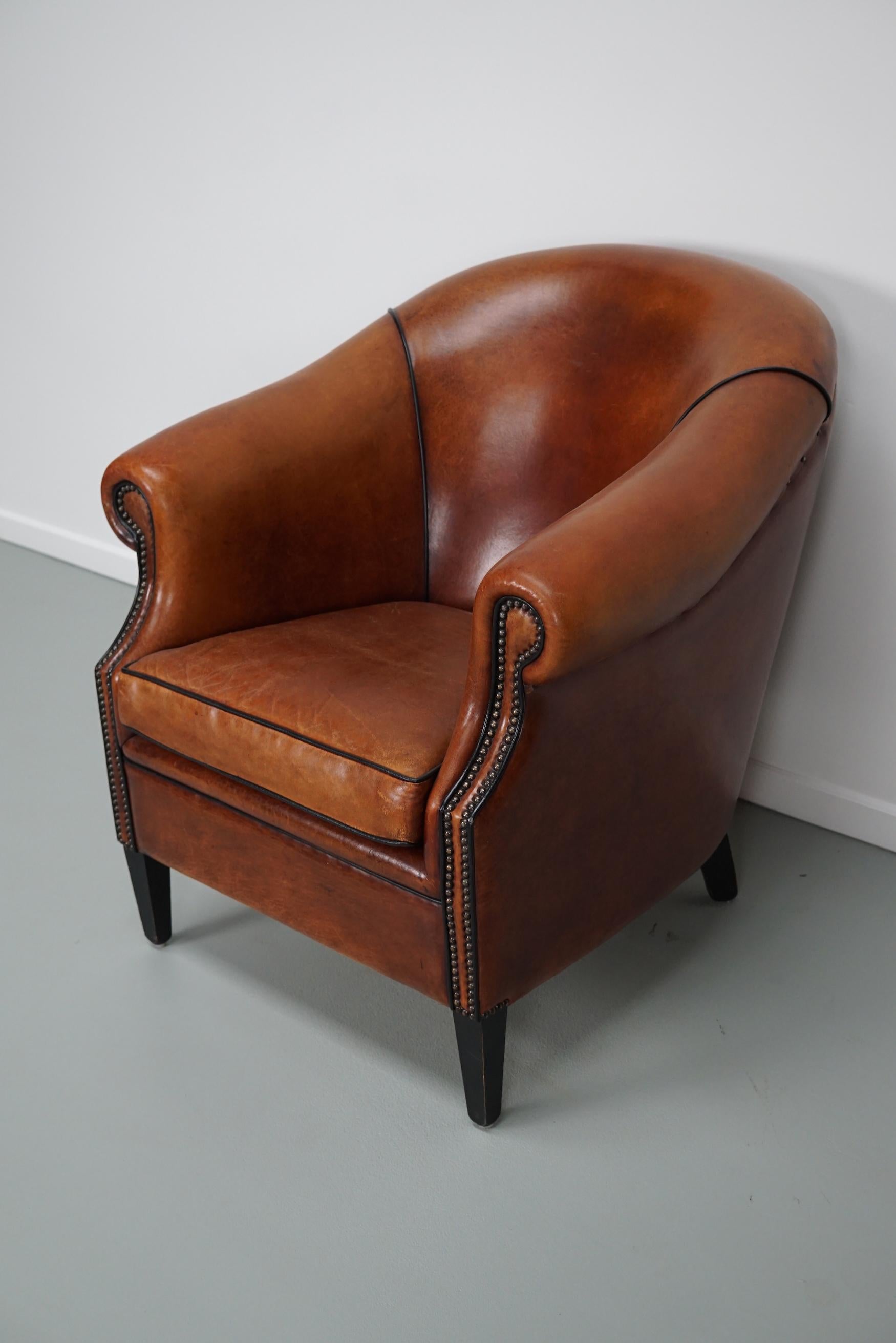 Cognacfarbener Clubsessel aus Leder im Angebot 2