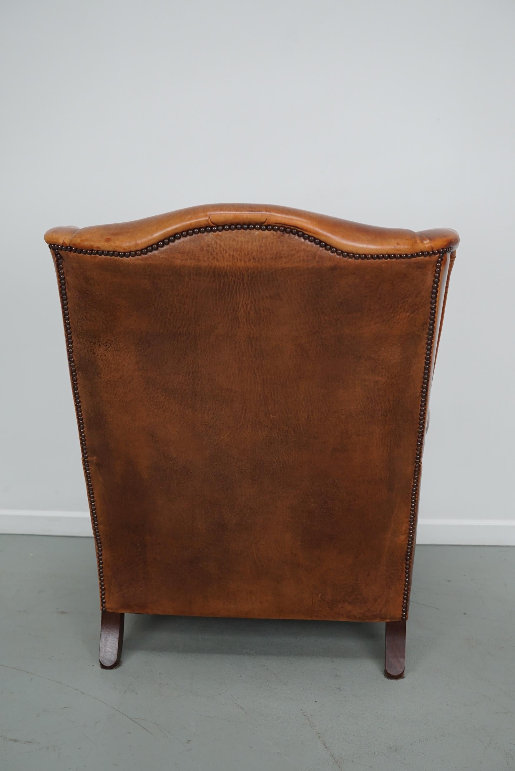 Cognacfarbener Clubsessel aus Leder im Angebot 3